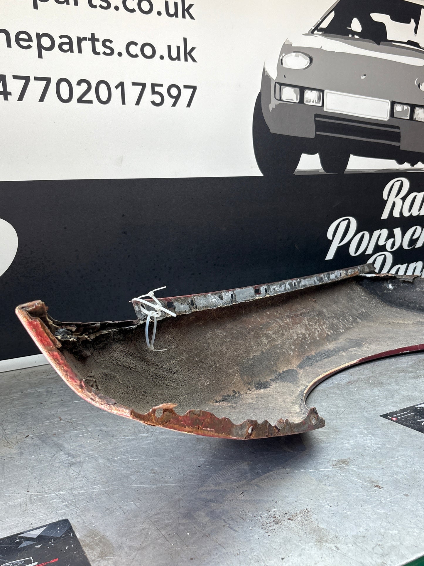 Porsche 944, early front right wing, in need of repair