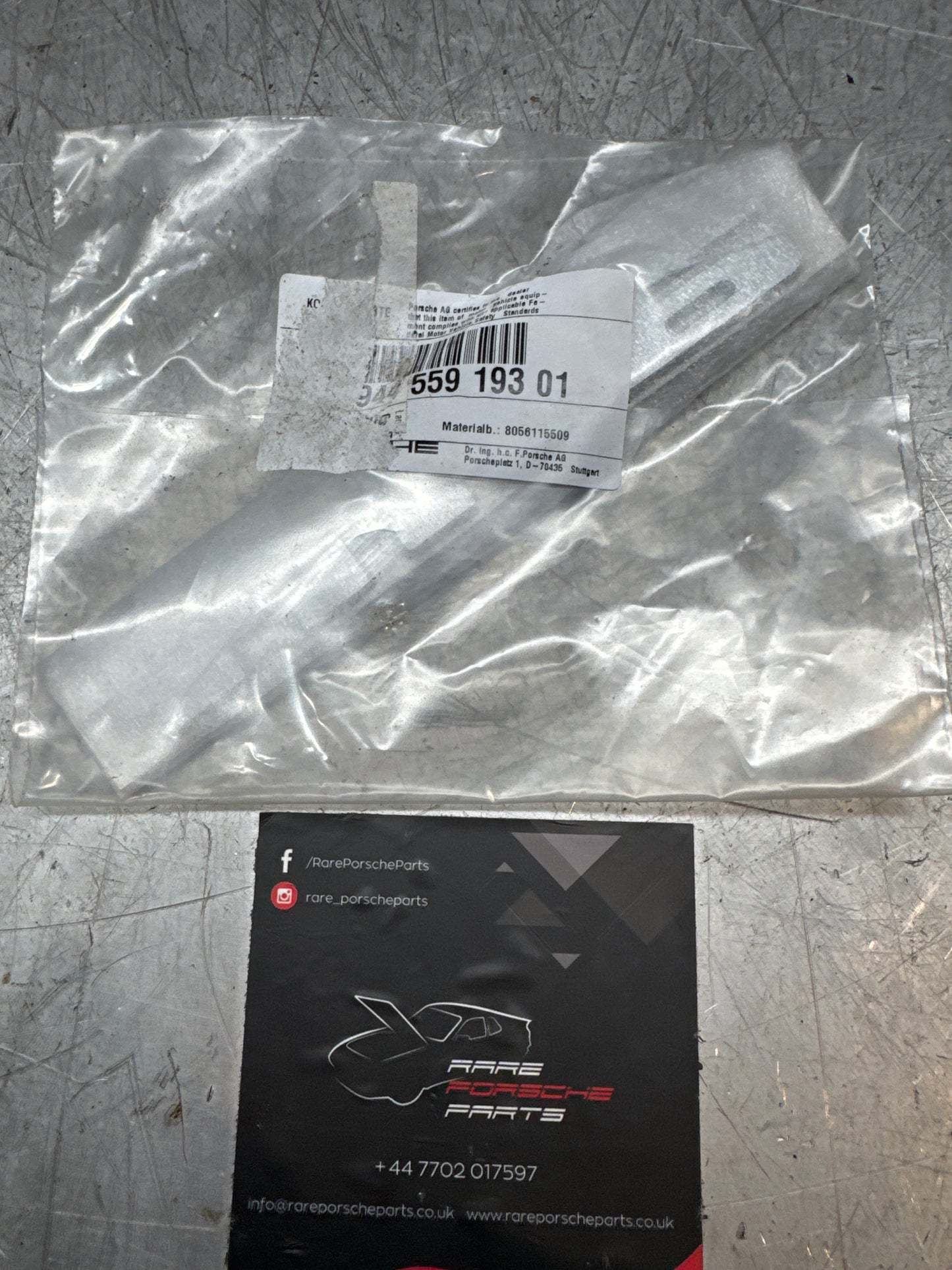 Porsche 944. rear hatch logo, original in silver 94455919301 Nos