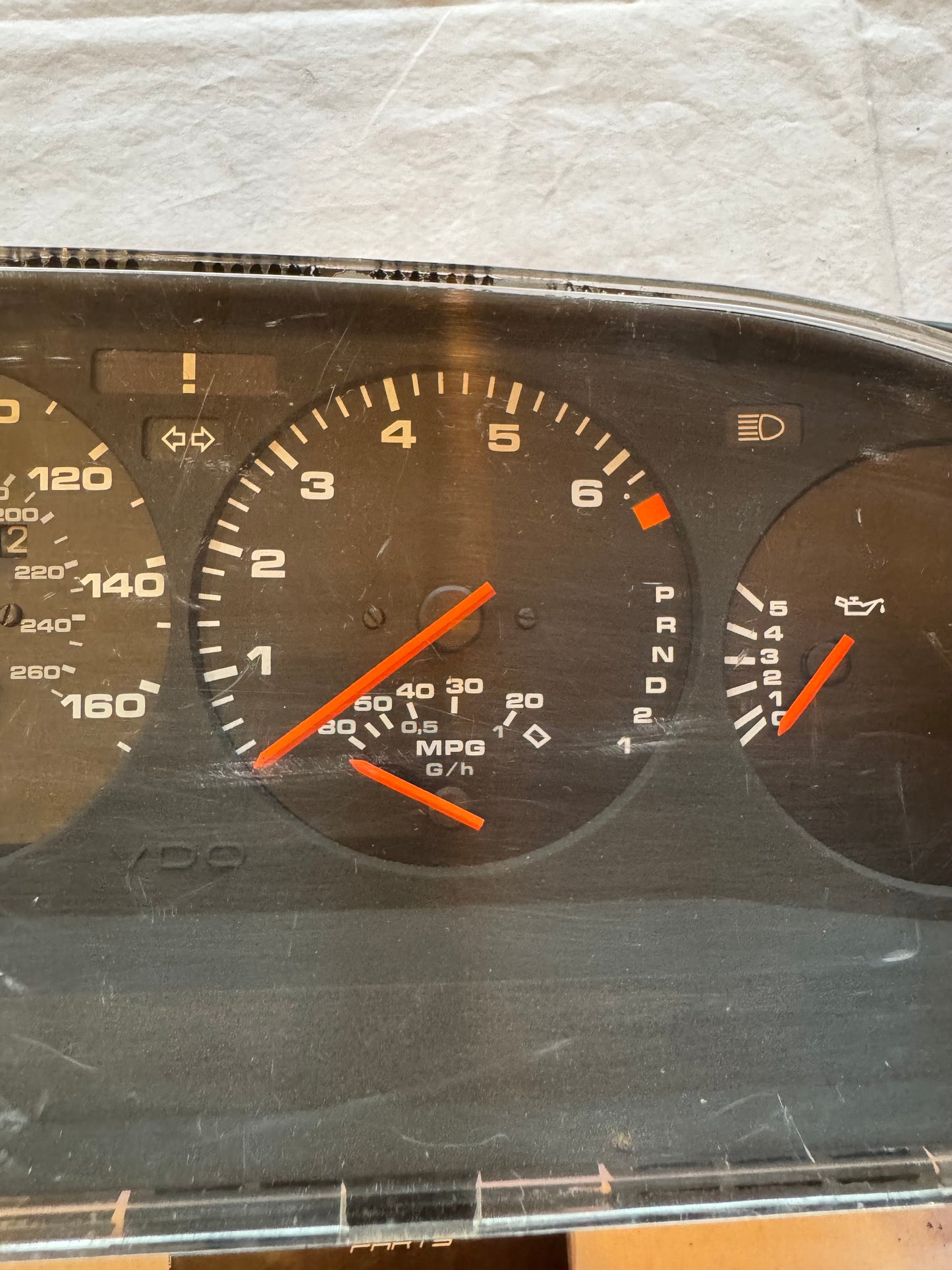 Porsche 944 dash clock binnacle pod speedometer, automatic 94564131101 used 136892 miles, scratched screen