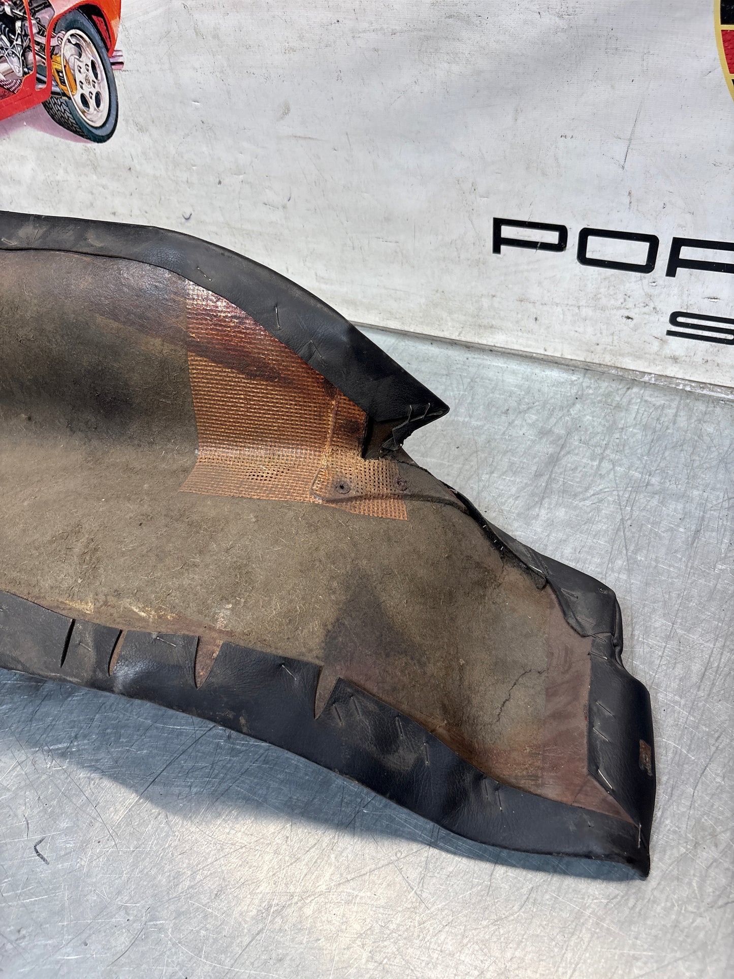 Porsche 928 early left side lower side trim panel, without loudspeaker, black used 92855502102