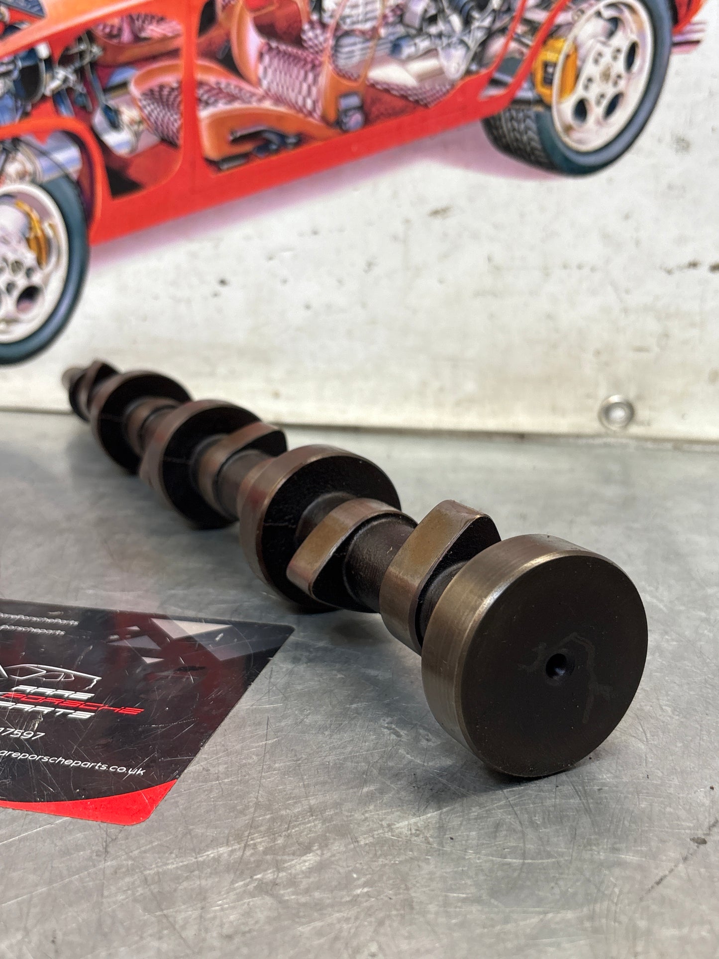 Porsche 928 cam shaft, used 9281051553R