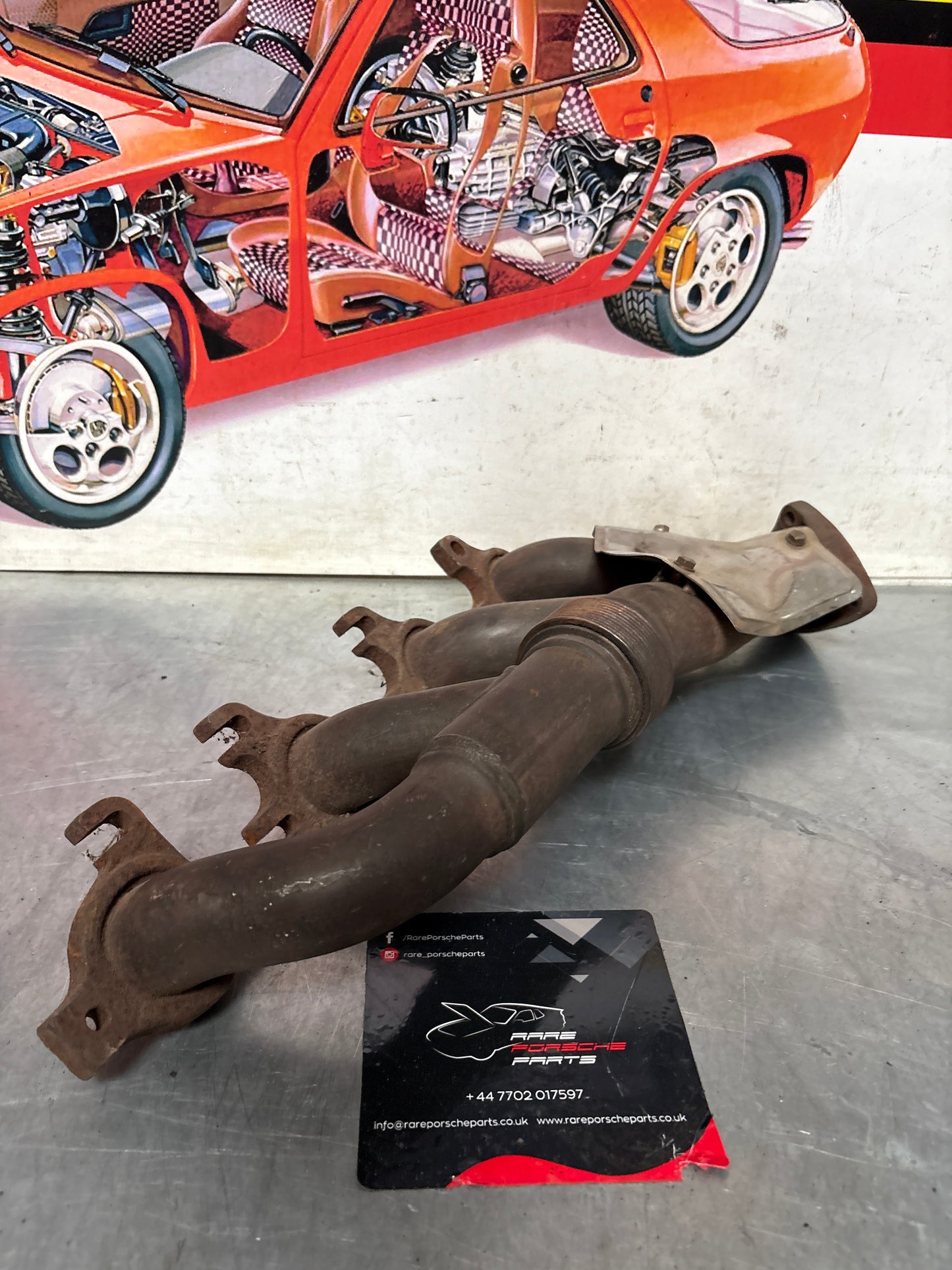 Porsche 928 S4 exhaust manifold, left 92811114507, used
