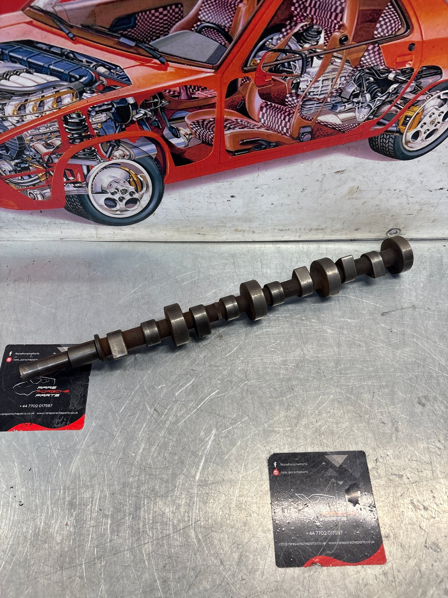 Porsche 928 cam shaft, used 9281052040R