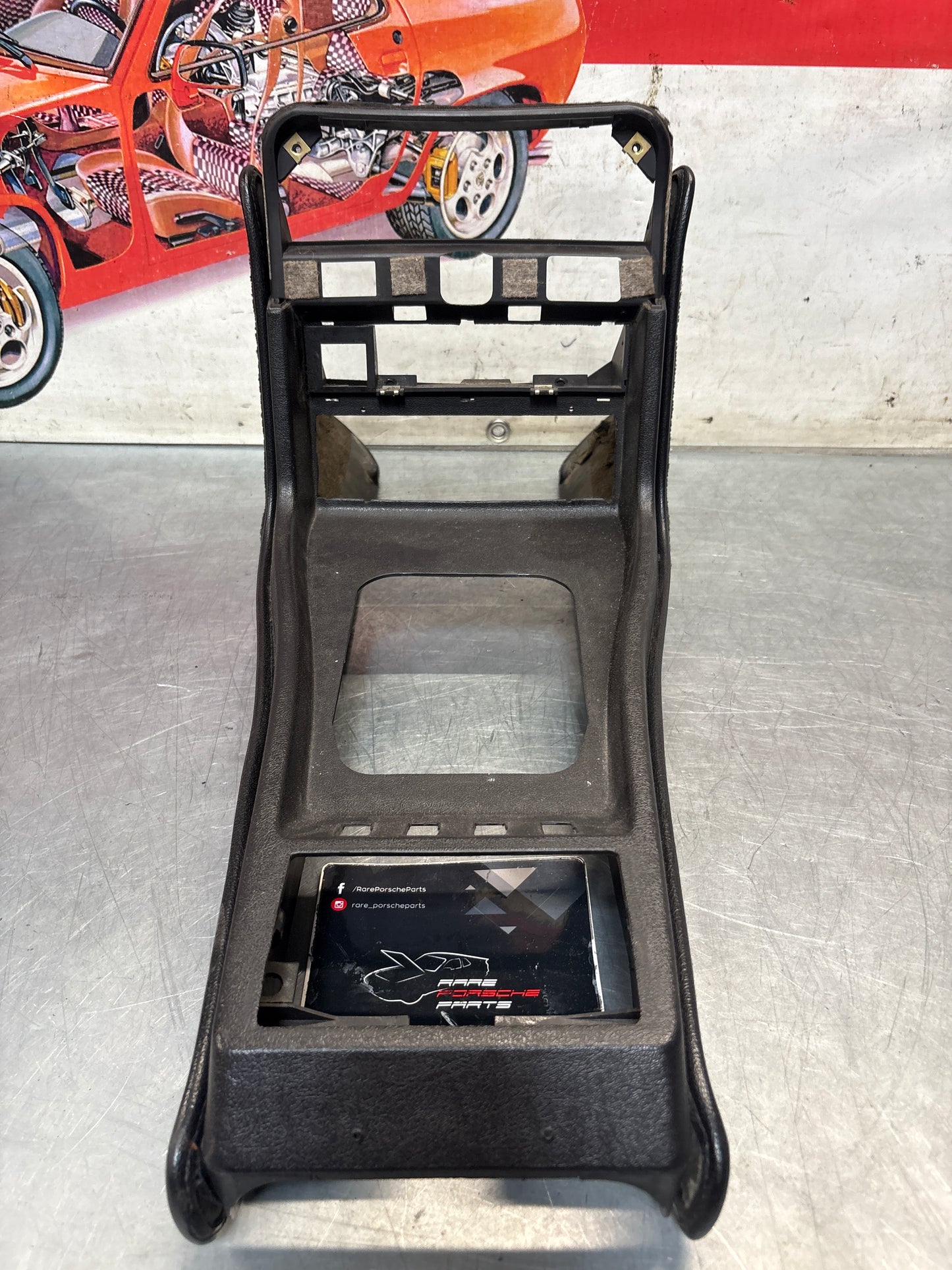 Porsche 924 centre console black, no switch holes 477857951  used