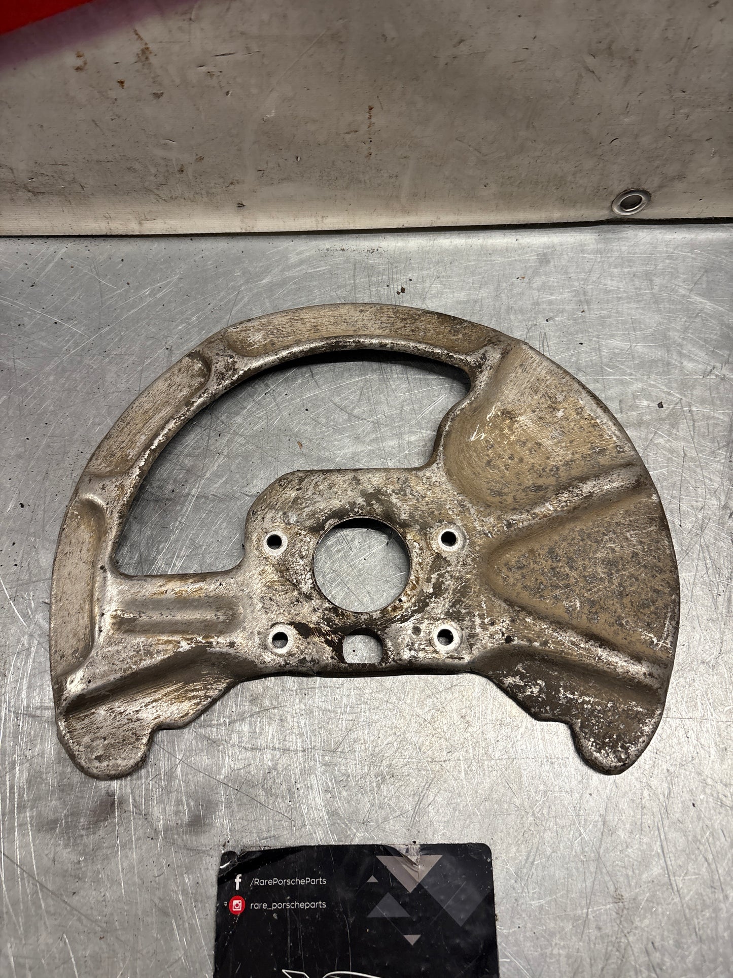 Porsche 928 front left brake disc cover plate, used 92835108304