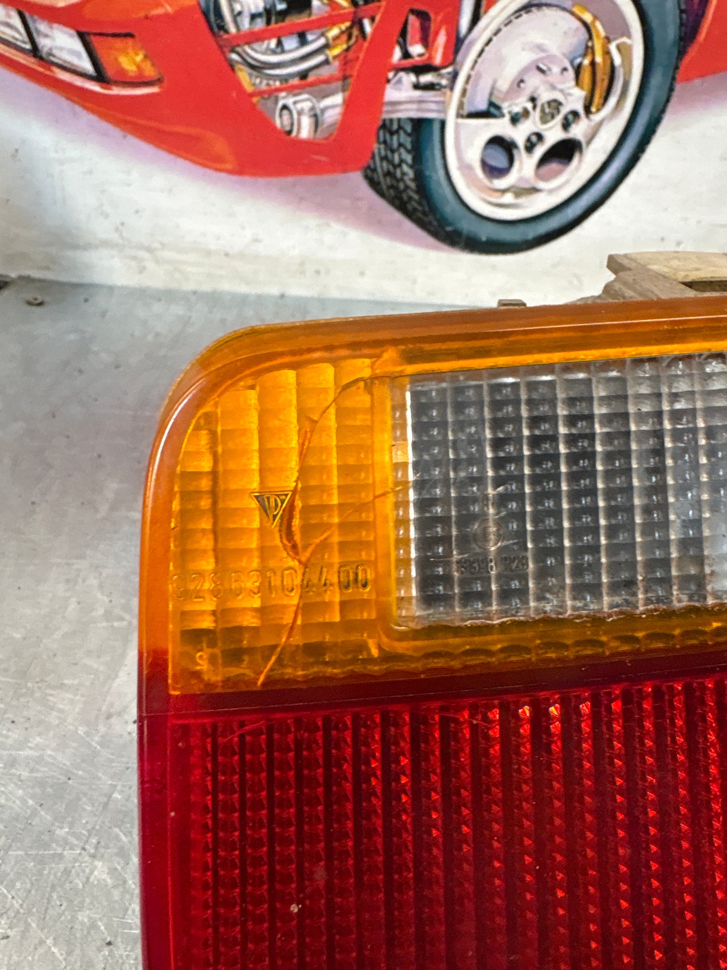 Porsche 928 rear right tail light, used, cracked 92863104400