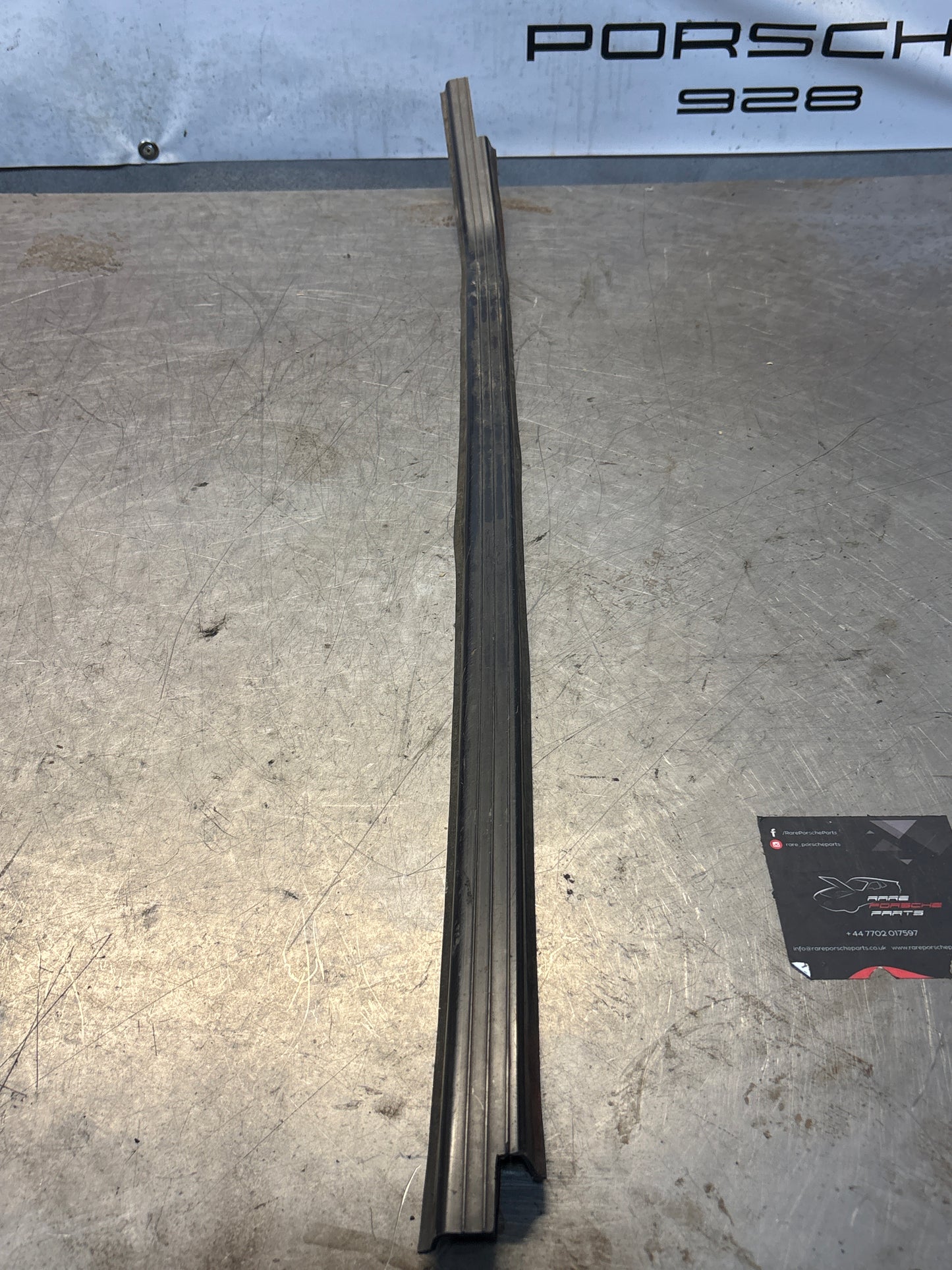 Porsche early 924/944 left sill trim, used 477853657A