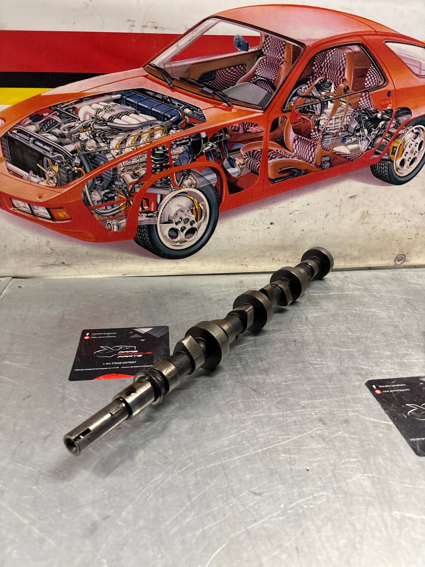 Porsche 928 cam shaft, used 9281051563R