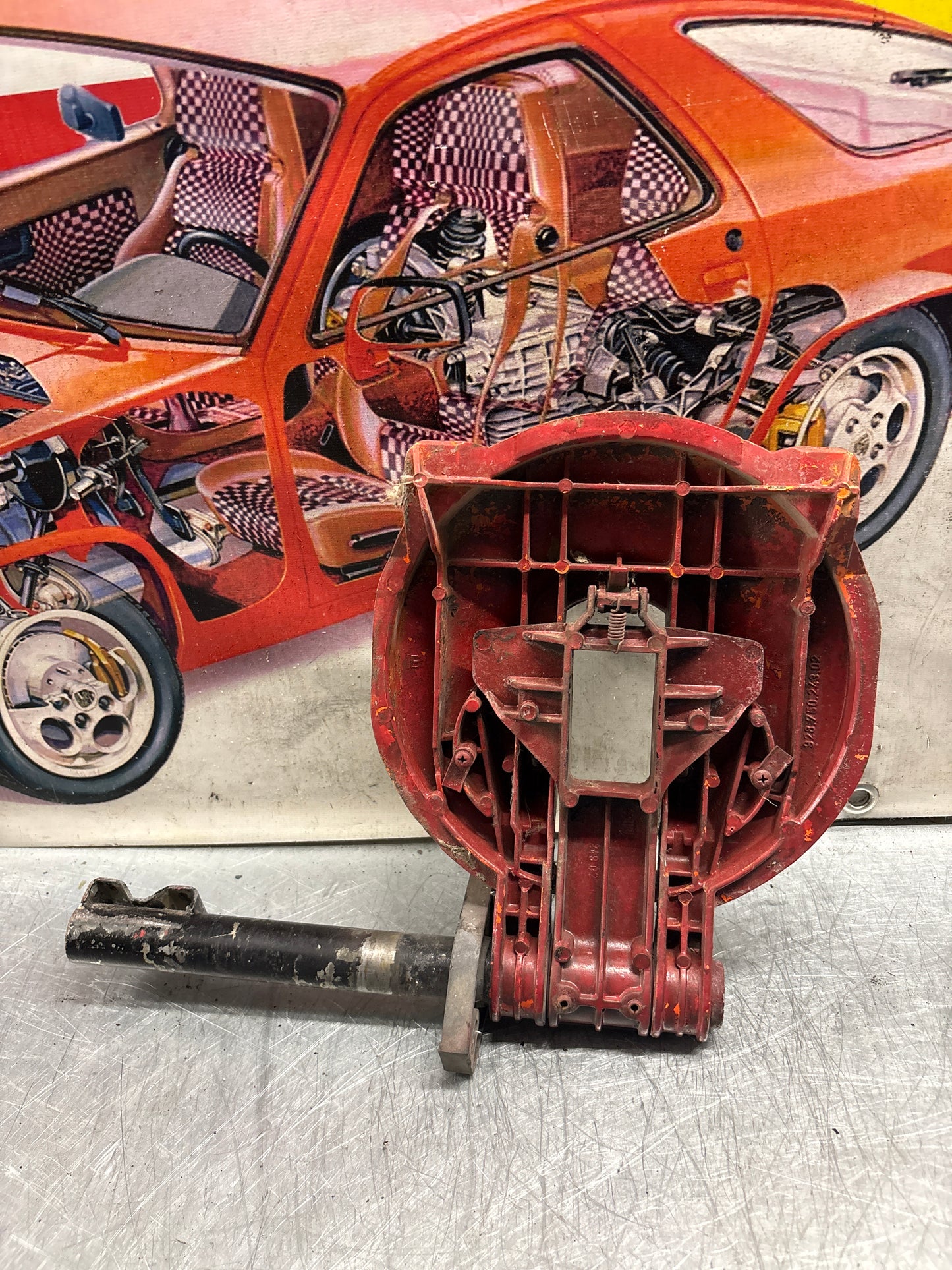 Porsche 928 left headlight swivel frame 92875024902 92875024302 used