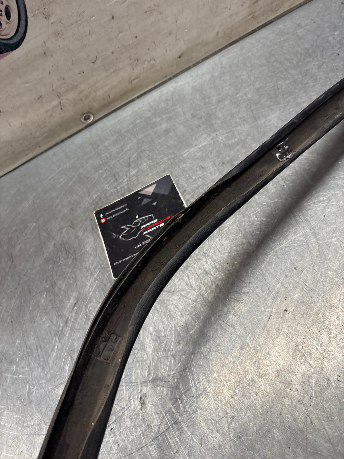 Porsche 928 right, off side door upper frame surround trim, black 92855502602, used