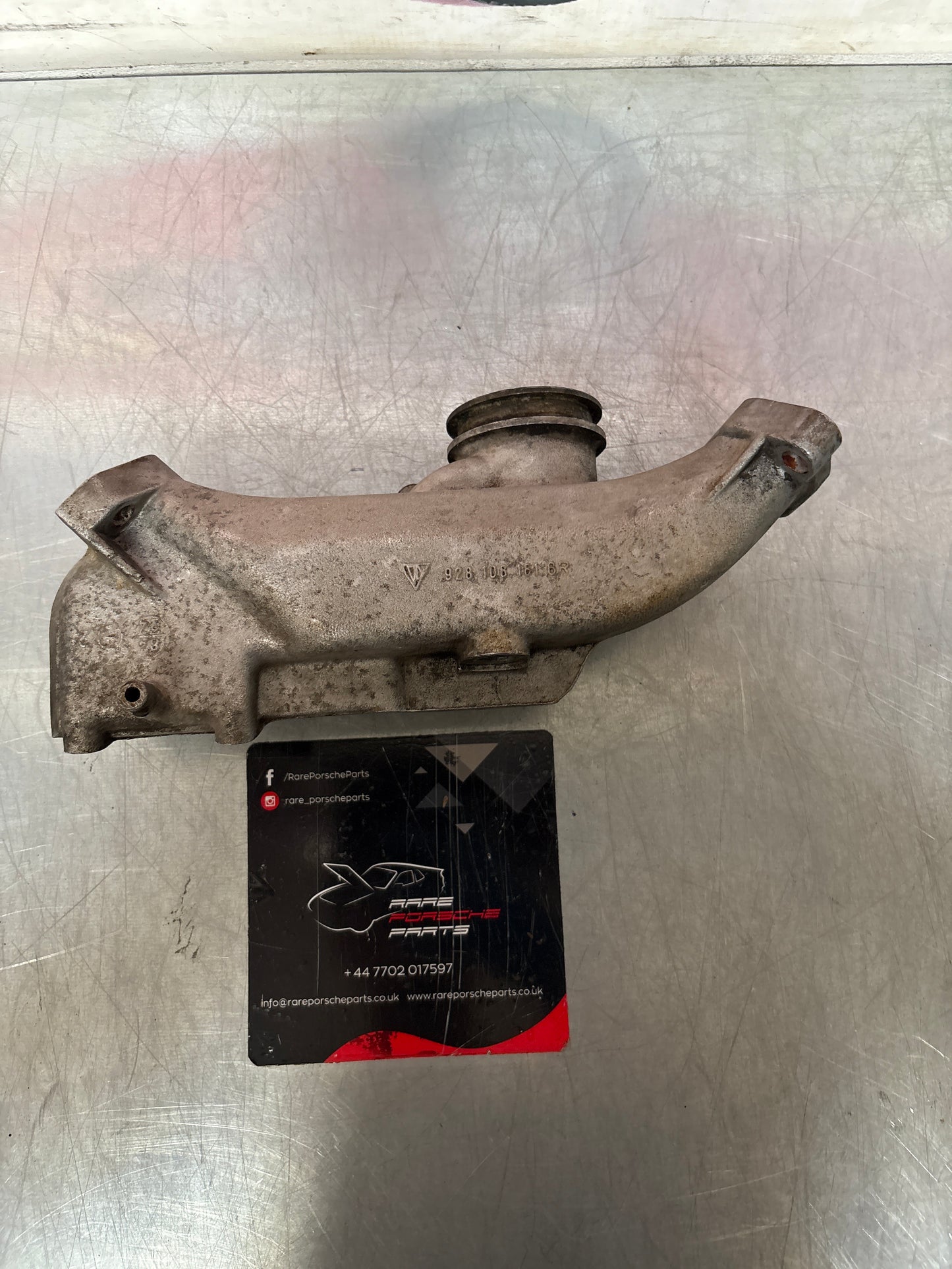 Porsche 928 thermostat housing, used 9281061616R