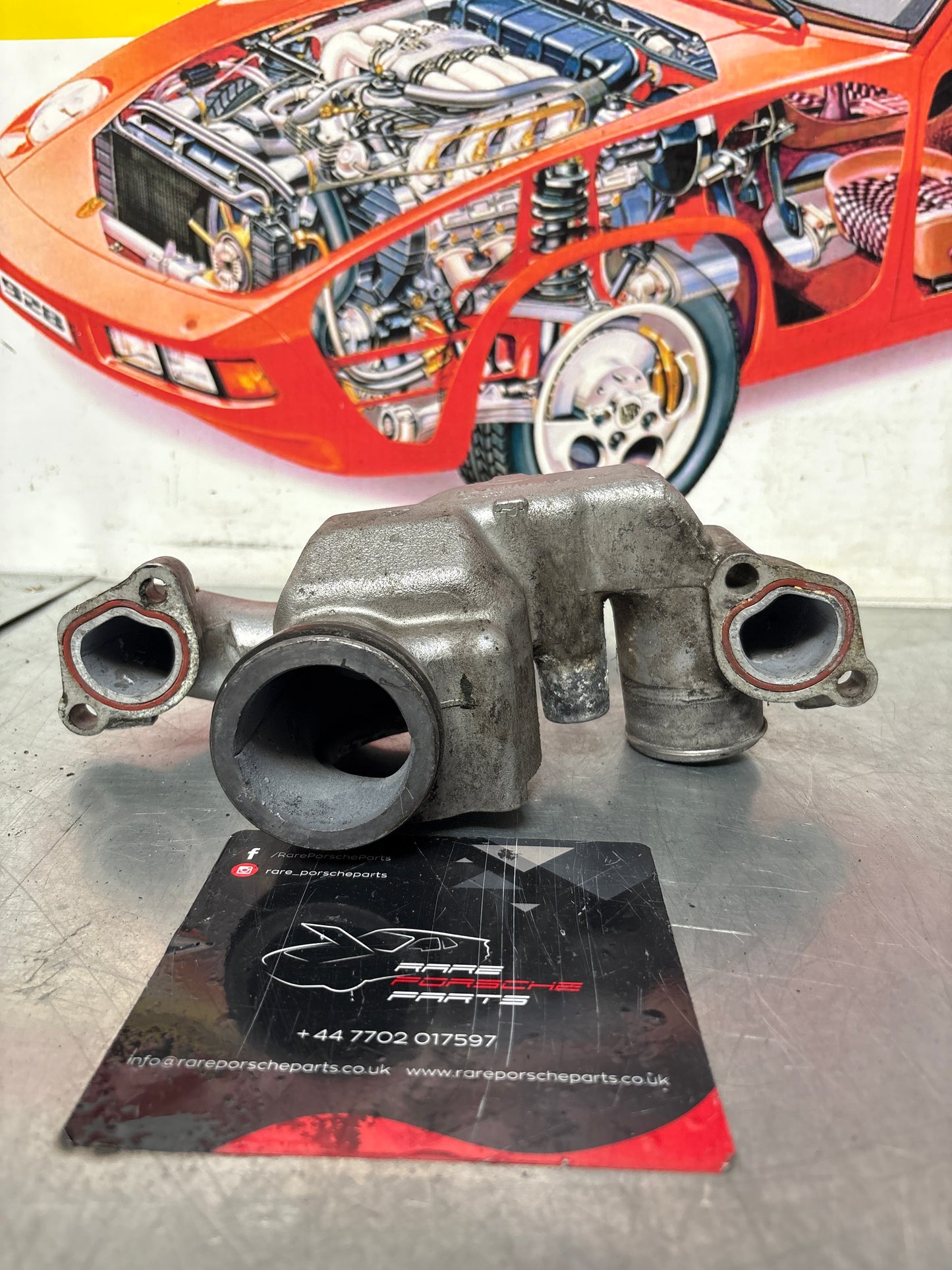 Porsche 928 thermostat housing, used 9281061652R