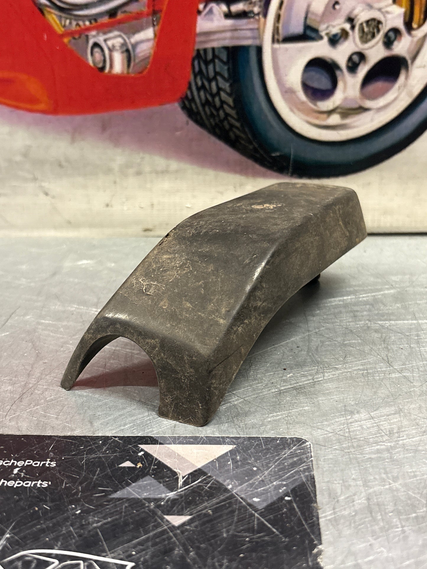 Porsche 924 / 944 front right bumper guard, used 477807156A