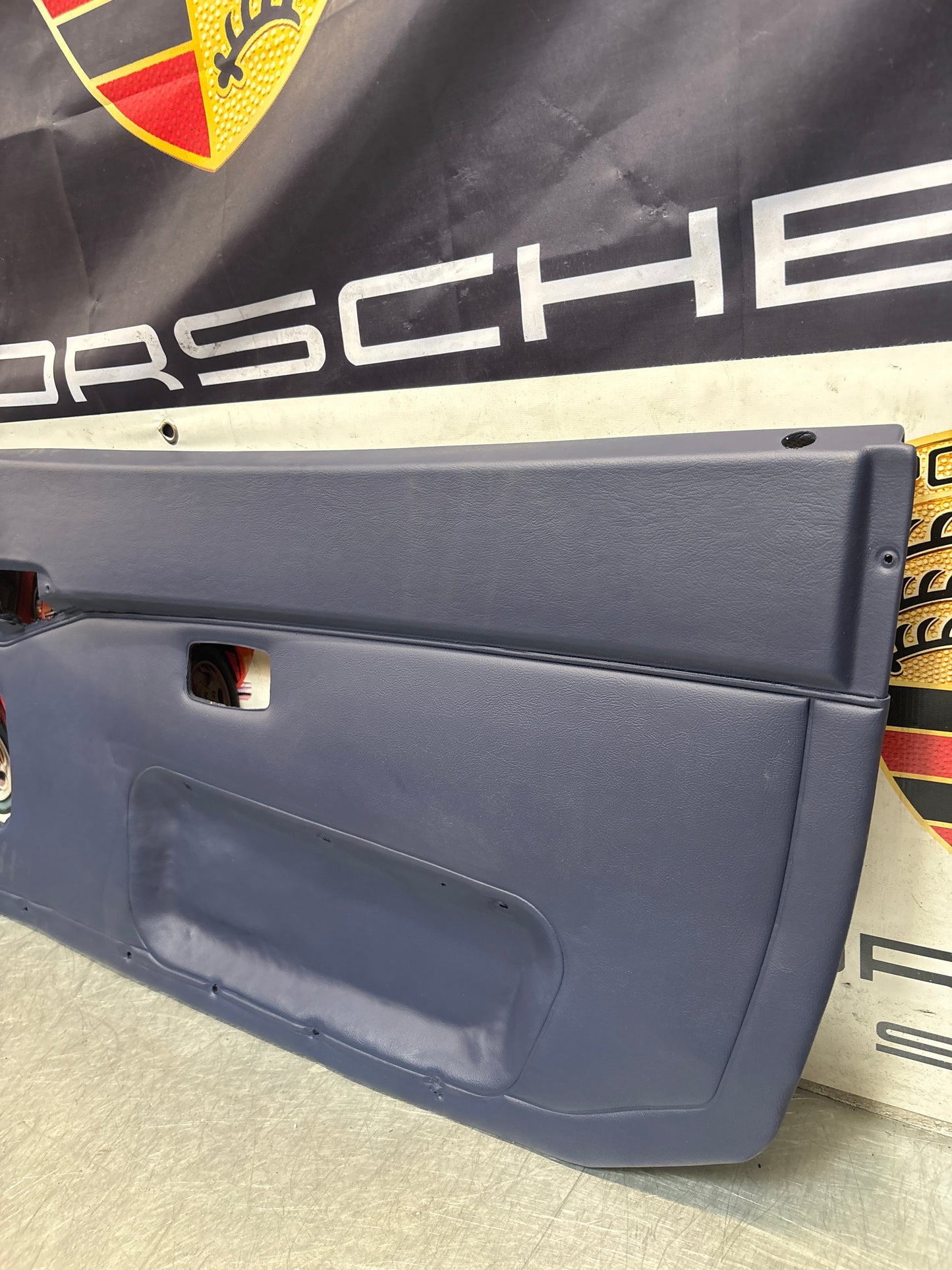 Porsche 944 blue door card, right  94455501801 refurbished, repainted.