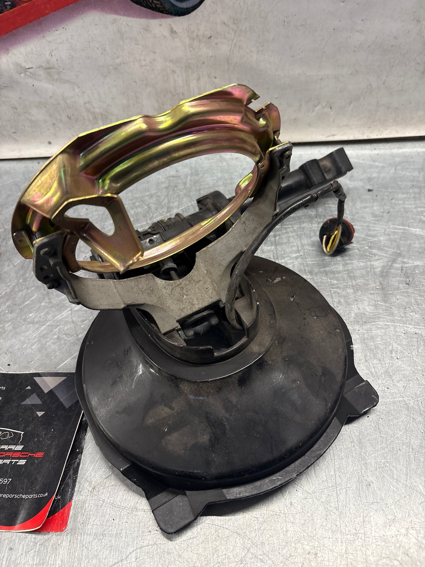 Porsche 928 right headlight swivel frame 92875024902 92875024302 used