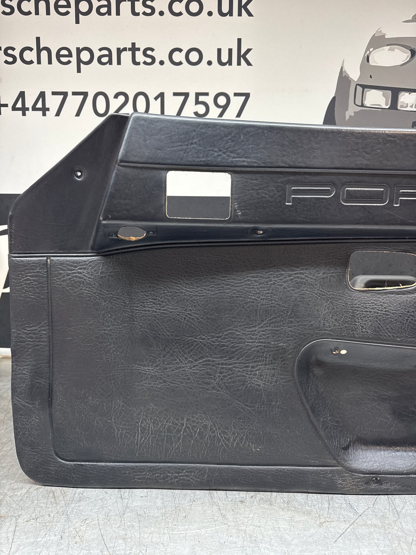 Porsche 924/ Early 944 Black RHD Drivers door card, Porsche Script. Fibreglass repaired. 478867011