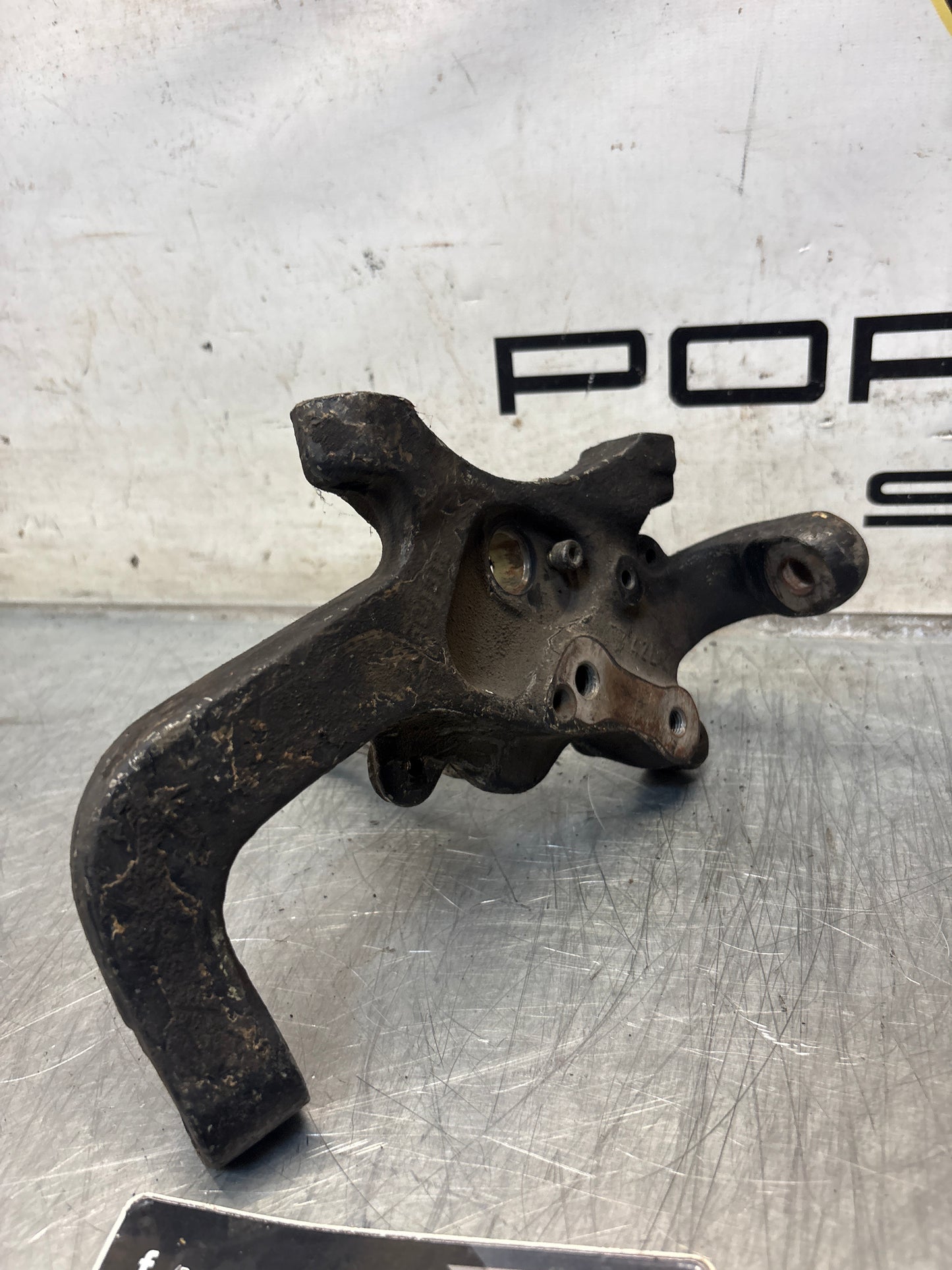 Porsche 928 left steering spindle knuckle, used 92834105717 / 92834105723