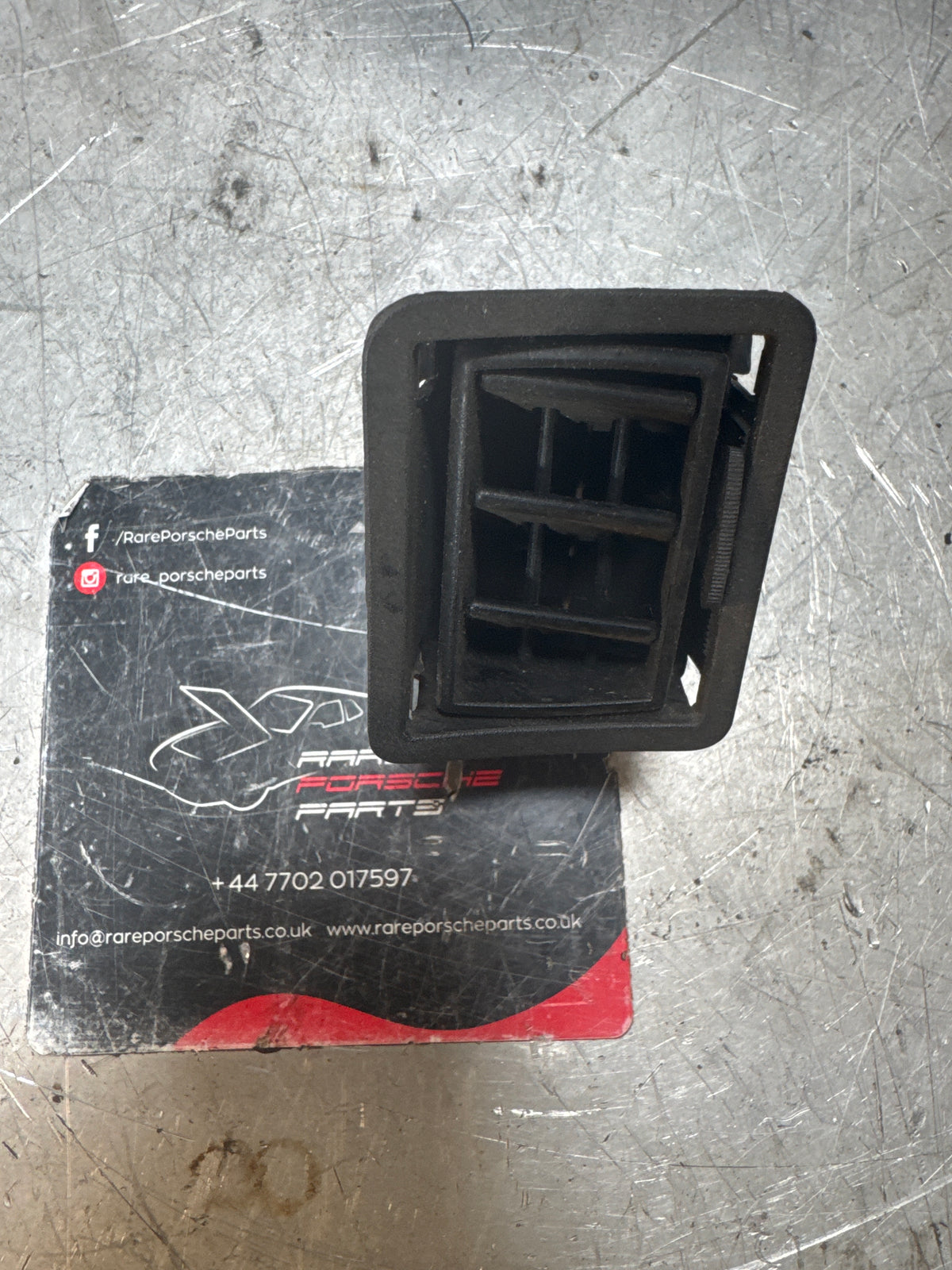 Porsche 924/944 Black dash air vent. Left hand, 477819231, used spares or repair