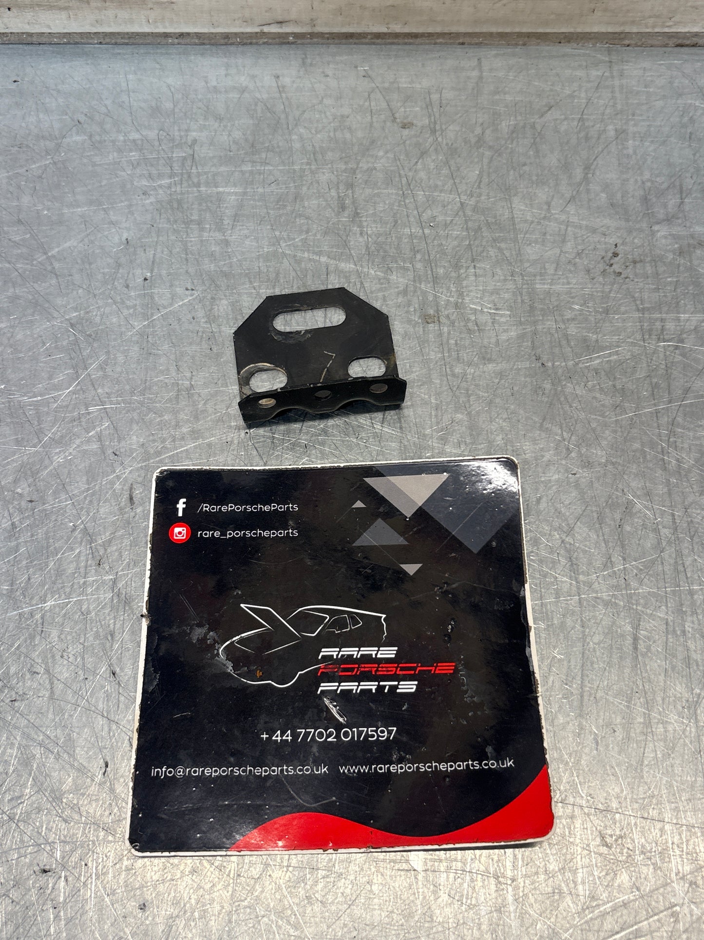 Porsche 944 fog light bracket, used 94450137500