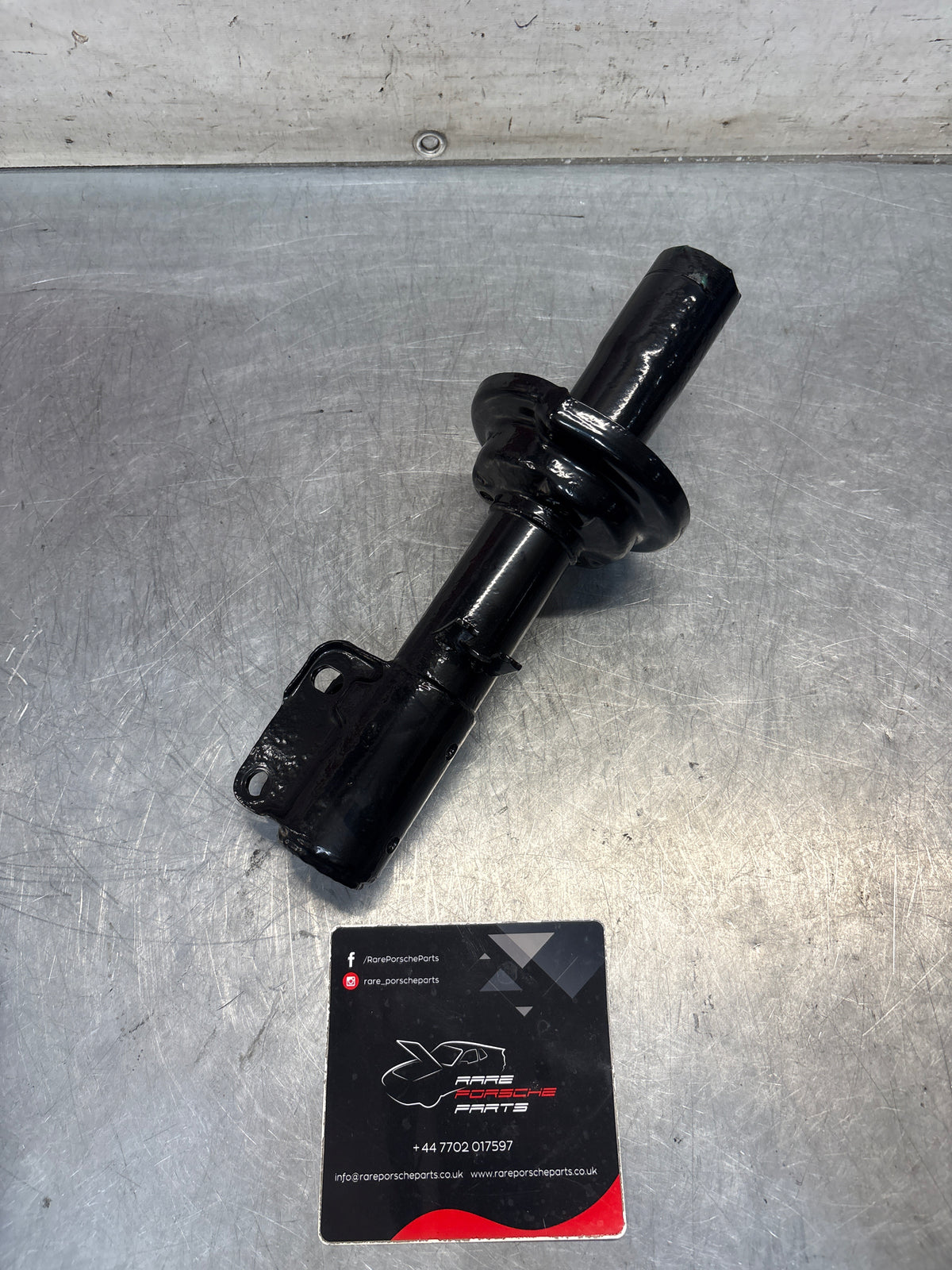 Porsche 924S / 944 left shock absorber strut, used 94434303111