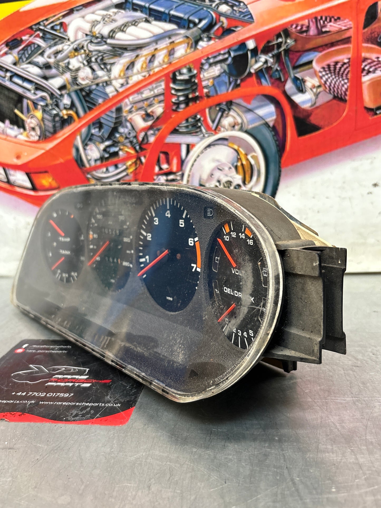 Porsche 928 dash clock binnacle pod speedometer, 92864110130 used  showing 105281 Km, plastic screen has some scratches