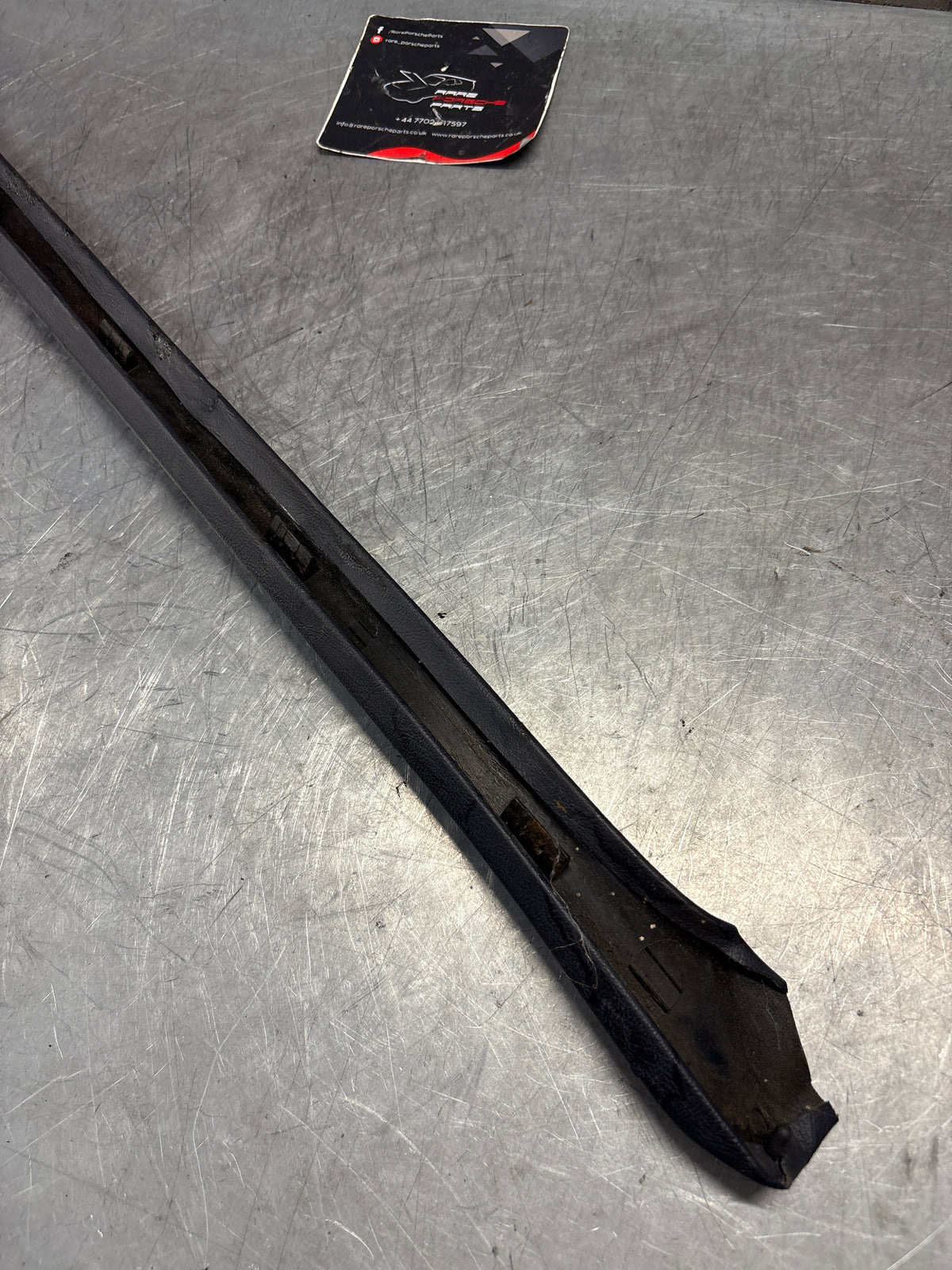 Porsche 928 tailgate trim, left, near side, marine blue, 92855503702, used