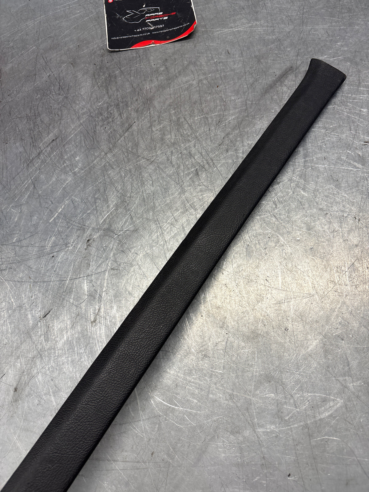 Porsche 928 tailgate trim, left, near side, black, 92855503702, used