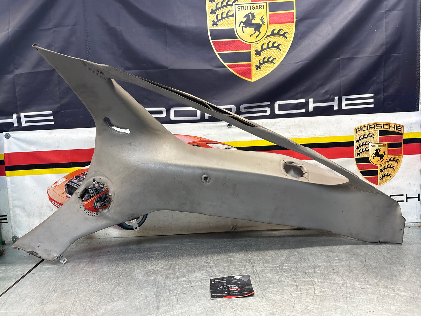 Porsche 928 right side lower side trim panel, grey used 92855502257