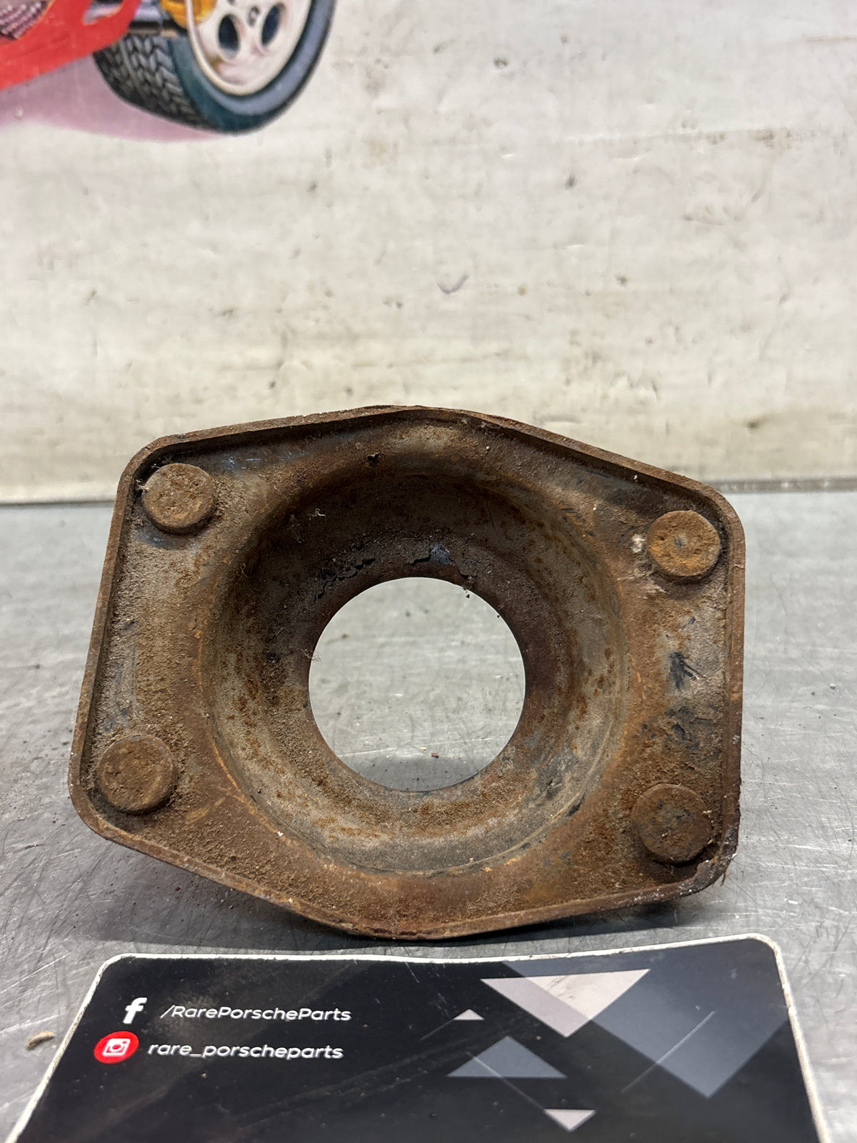 Porsche 924 / 944 front suspension bearing flange, 477412345, used