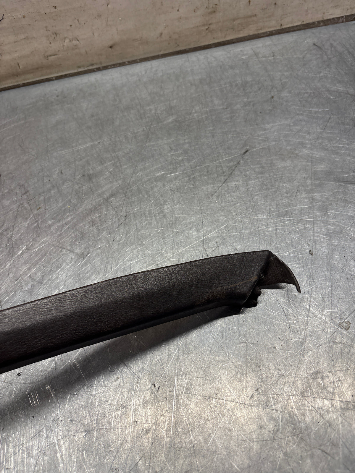 Porsche 928 left, off side door upper frame surround trim, brown 92855502502, used
