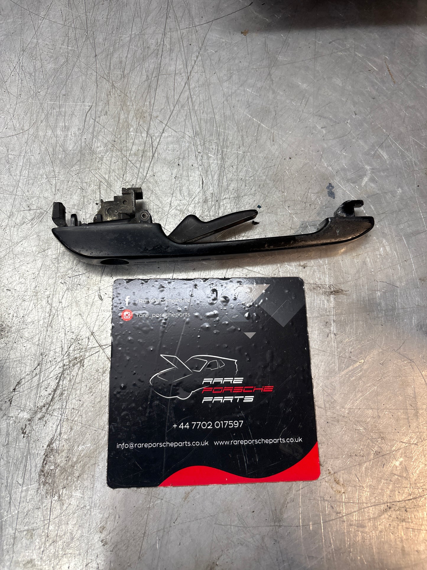 Porsche 944 scripted right door handle, used 94453706200