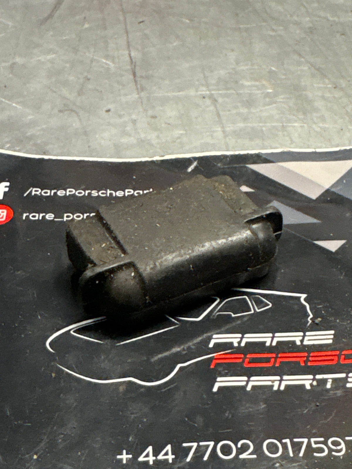 Porsche 914 seat rail end plug, used 311881349