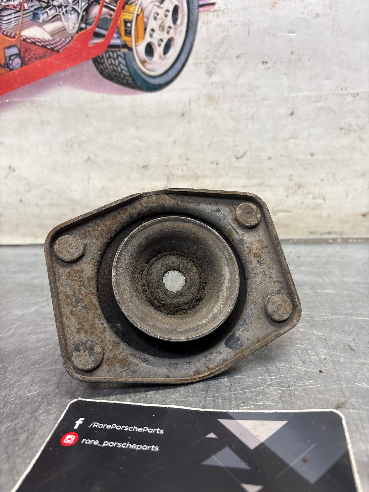 Porsche 924 / 944 front suspension bearing flange, 477412345, used