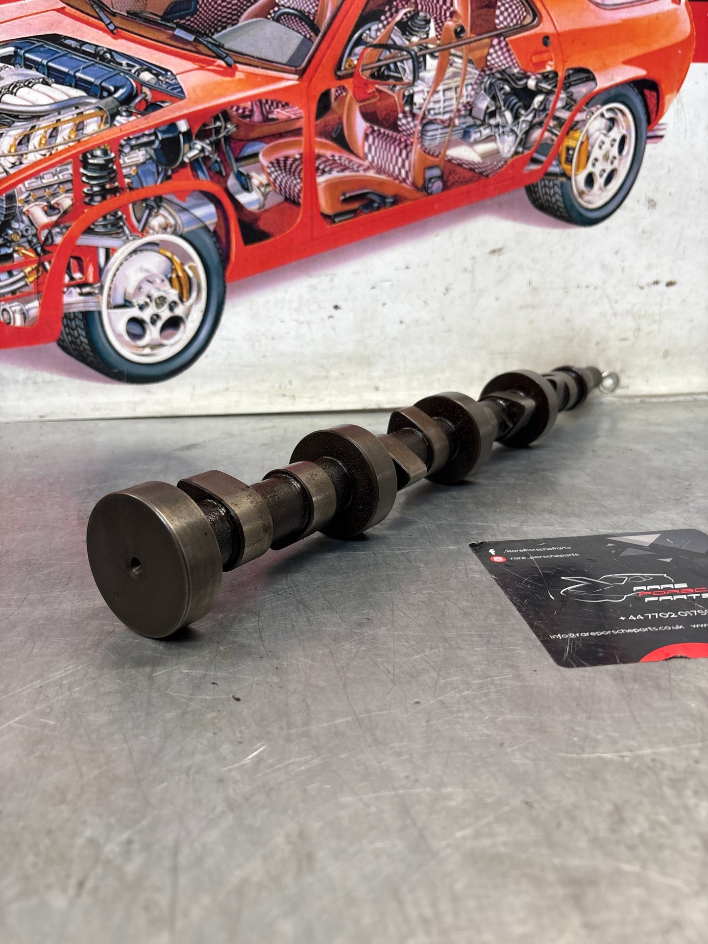 Porsche 928 cam shaft, used 9281051553R