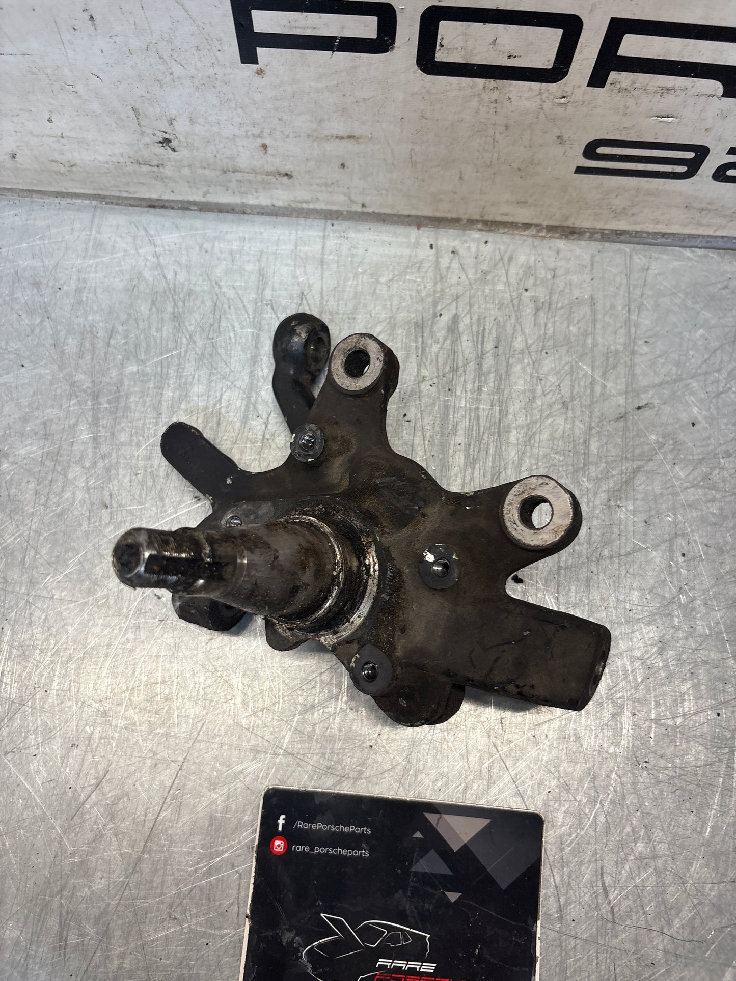 Porsche 928 right steering spindle knuckle, used 92834105817