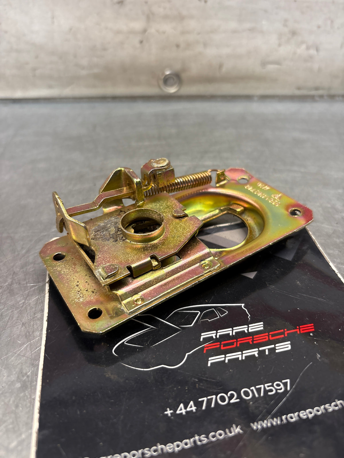 Porsche 928 lid lock lower part, refurbished 92851102702