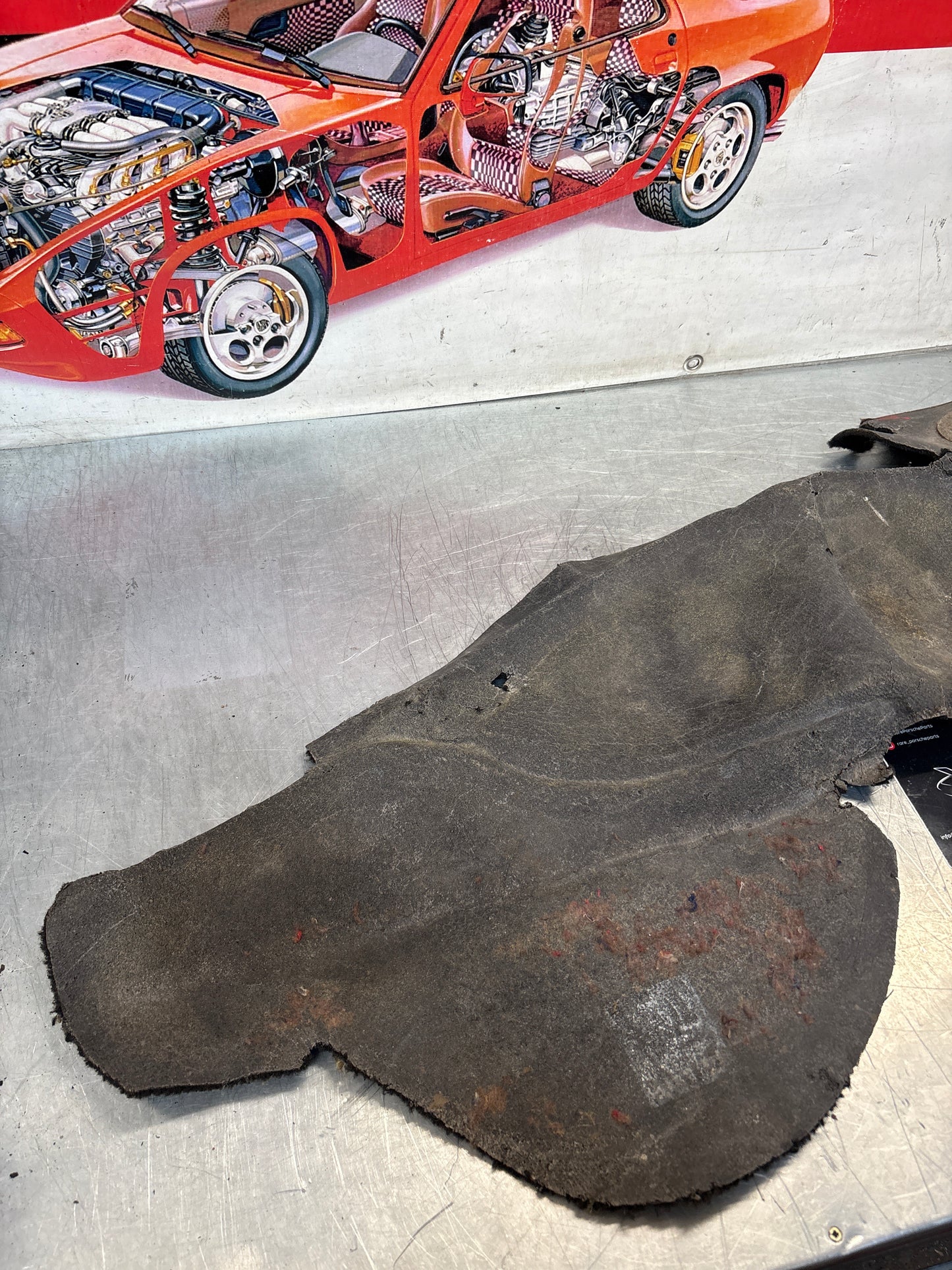 Porsche 924/944 85.5- rear left side trim carpet, black, 94455508301, used