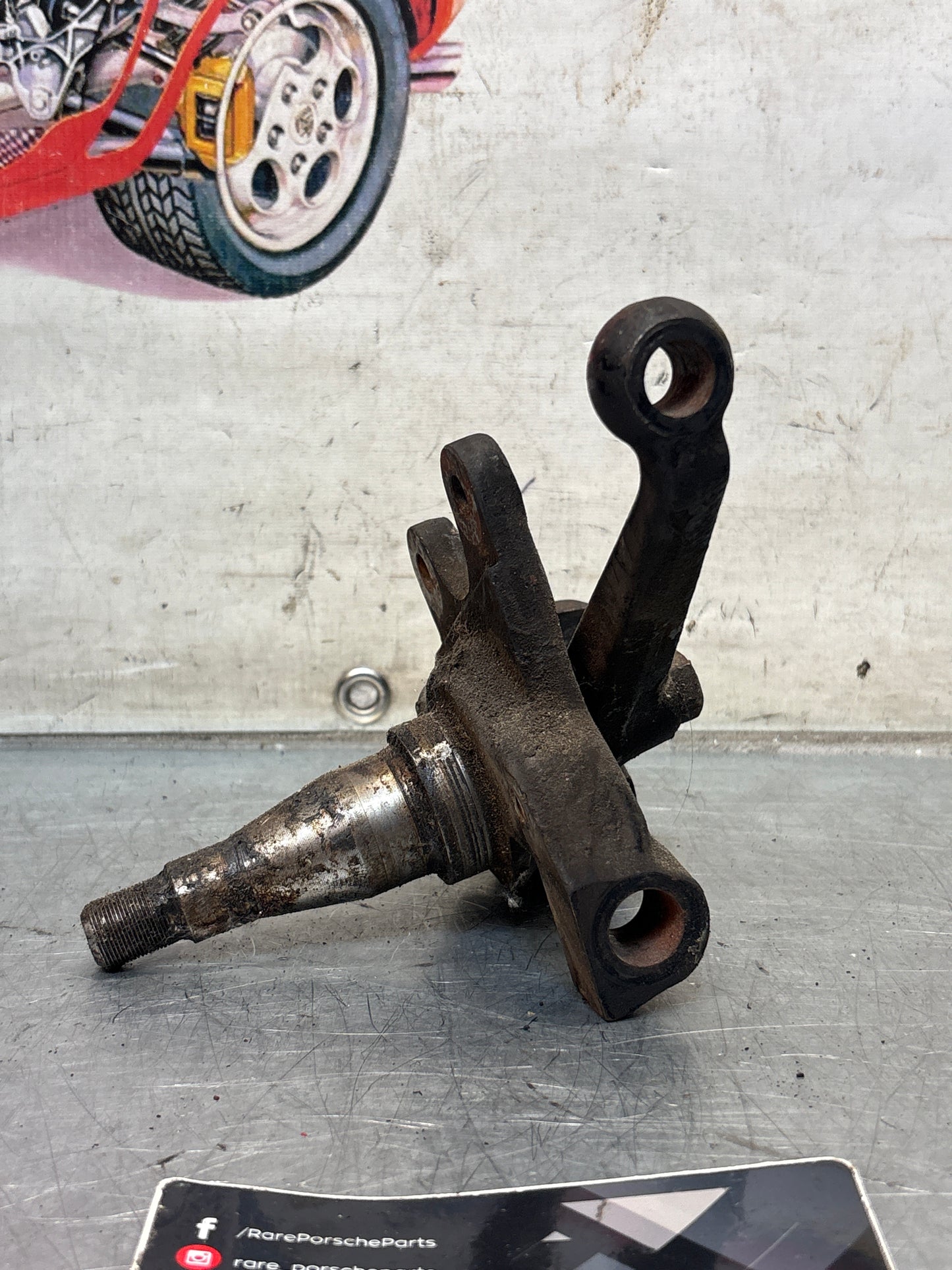 Porsche 928 left steering spindle knuckle, used 92834105703