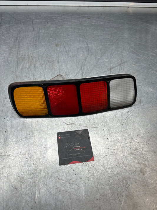 Porsche 928 rear left light lens, used 92863140300