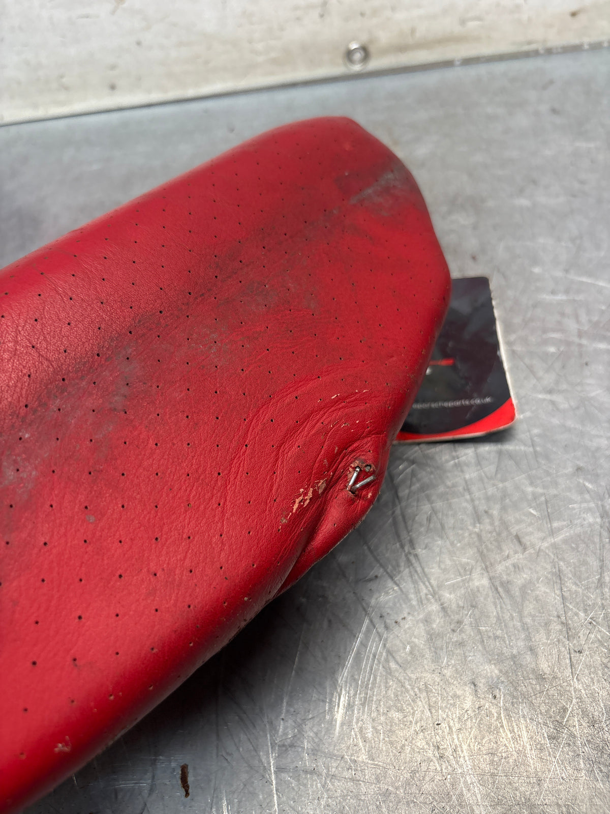 Porsche 928 rear left seat centre cushion, can-can red , leather, used 92852208751