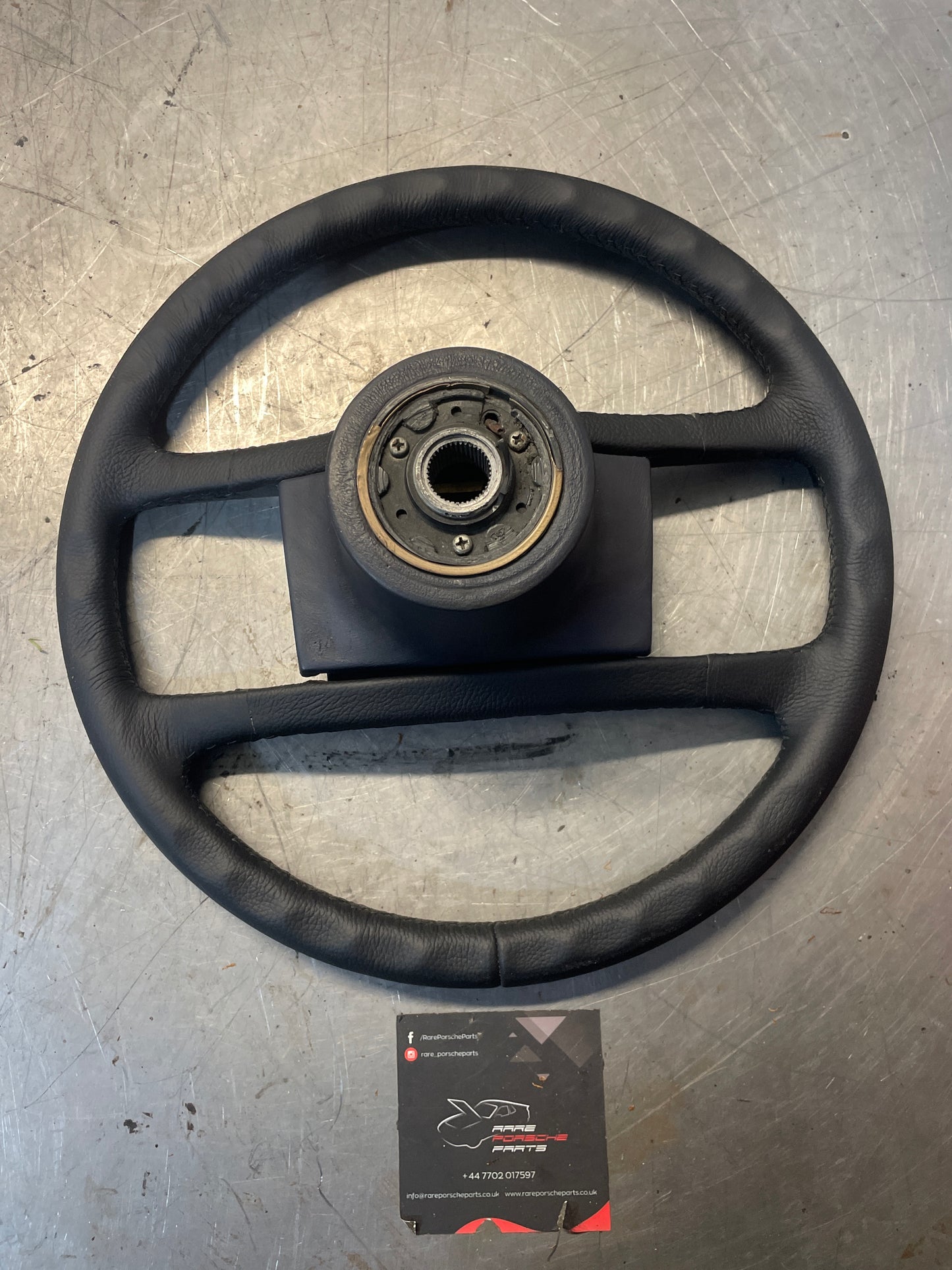 Porsche 928 steering wheel 92834708402, refurbished