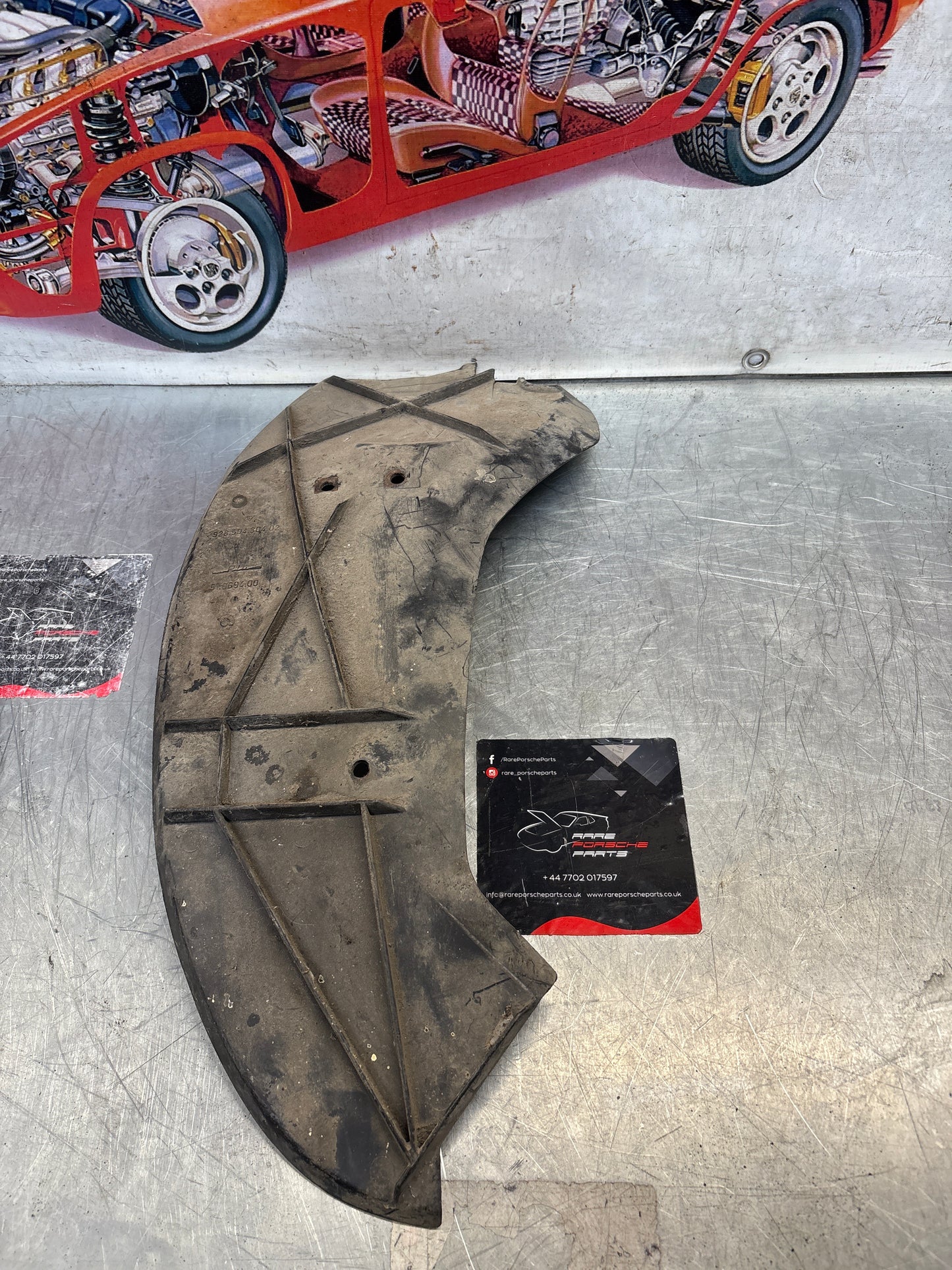 Porsche 928 rear right fender wheel cover, used 92850430402