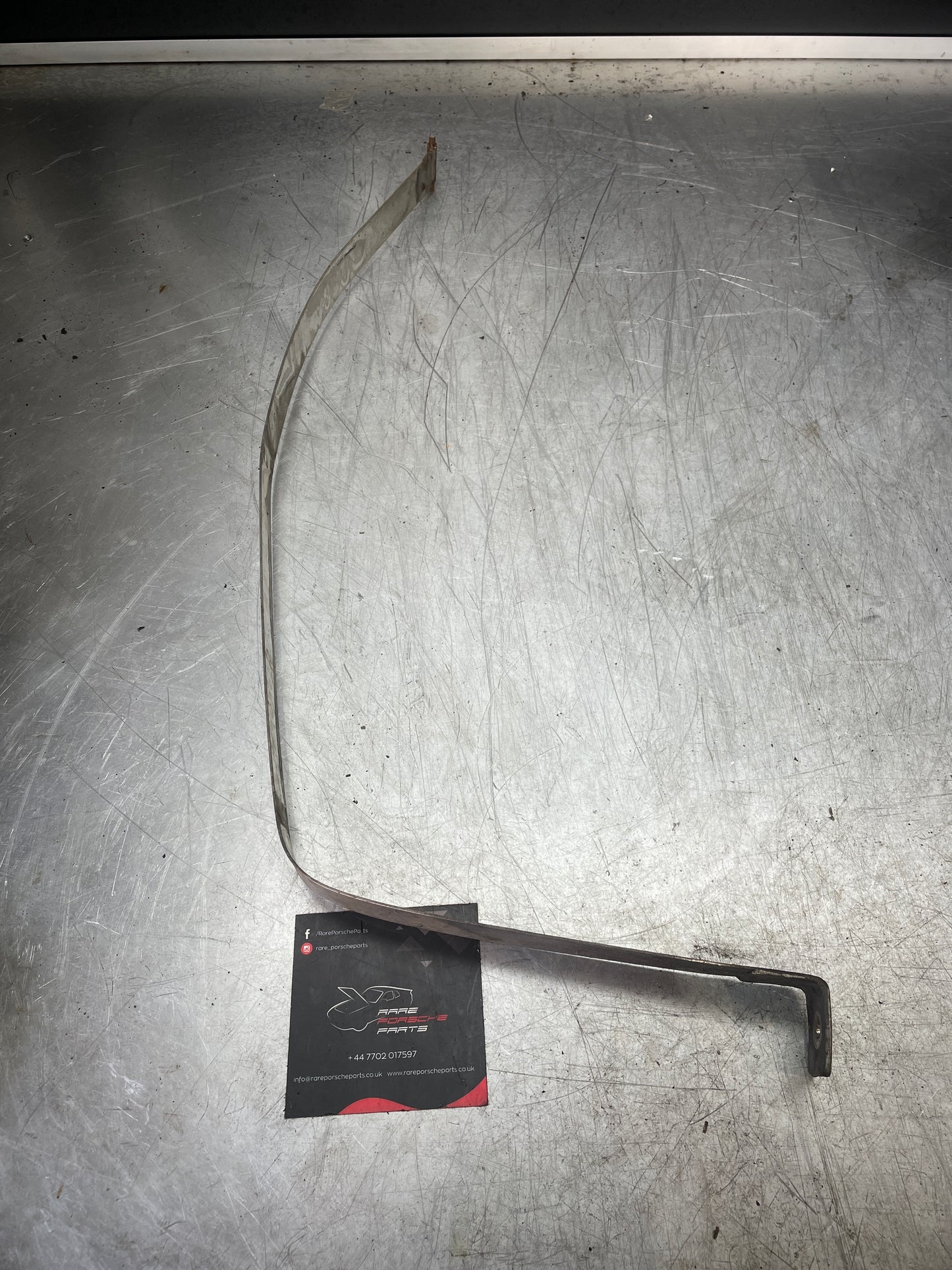 Porsche 944 fuel tank restraining strap, right used 95120131201 aftermarket, stainless steel