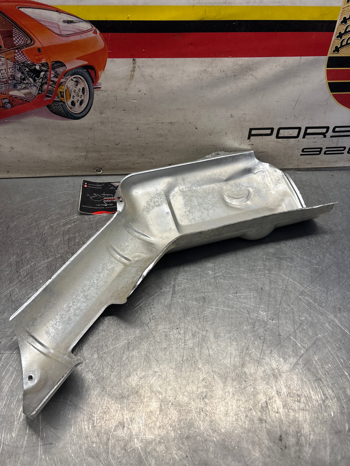 Porsche 928 79-80 heat shield protection plate 92850493104 Earlyer type without ribs, refurbished