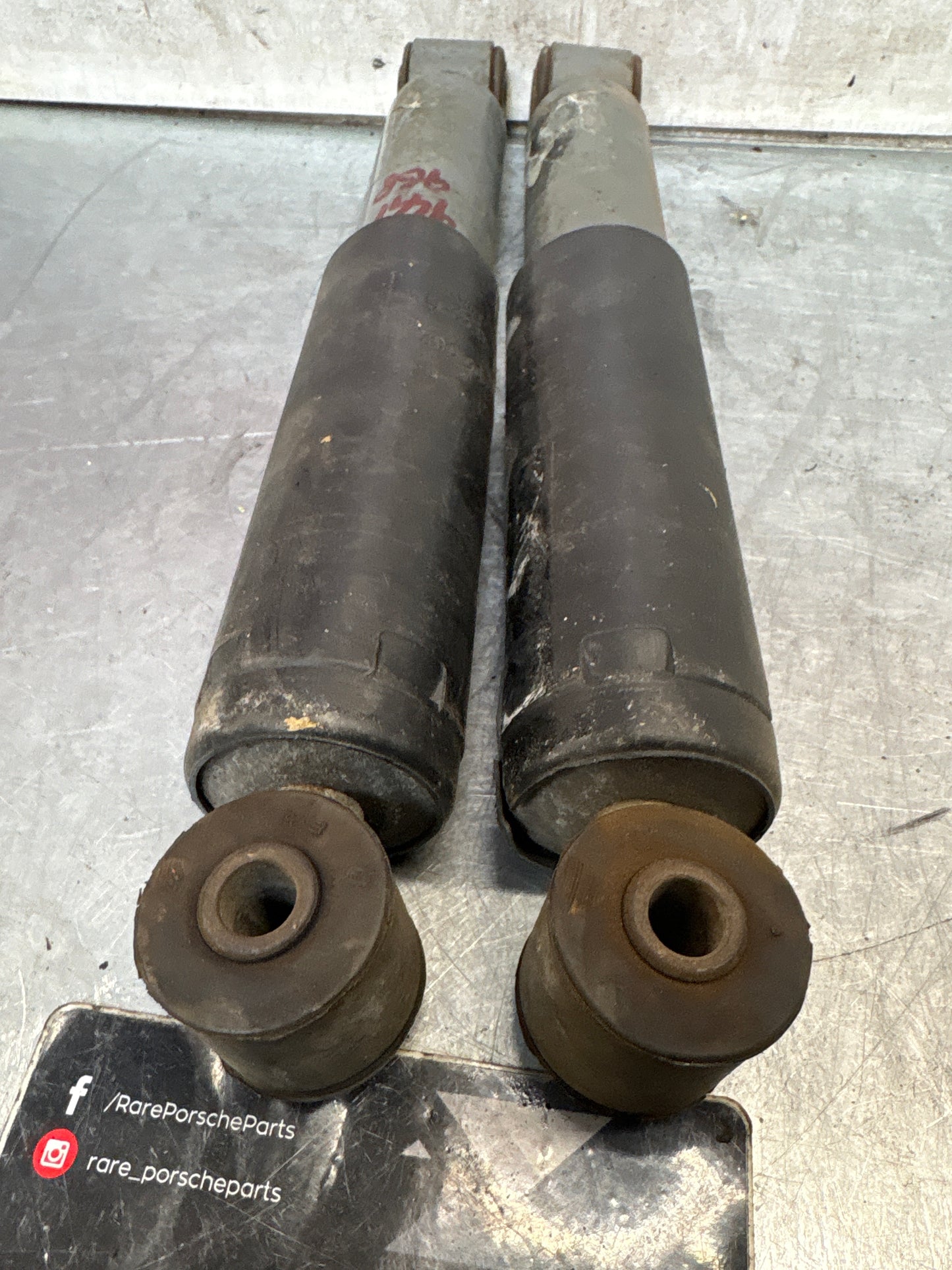 Porsche 944 86- pair of rear suspension shock absorbers, used 95133303205