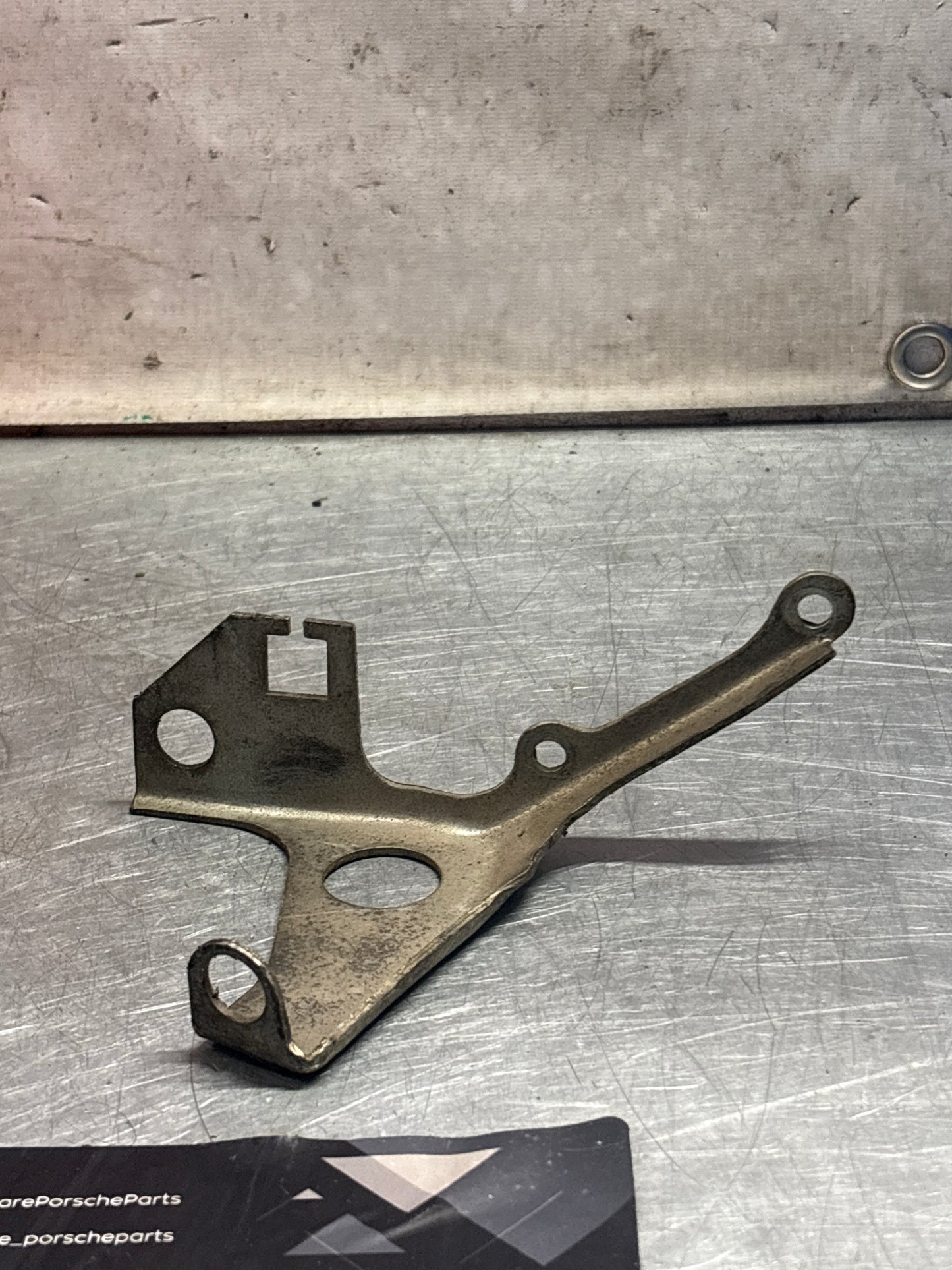 Porsche 928 intake flow meter cable guide bracket, used 92811021703