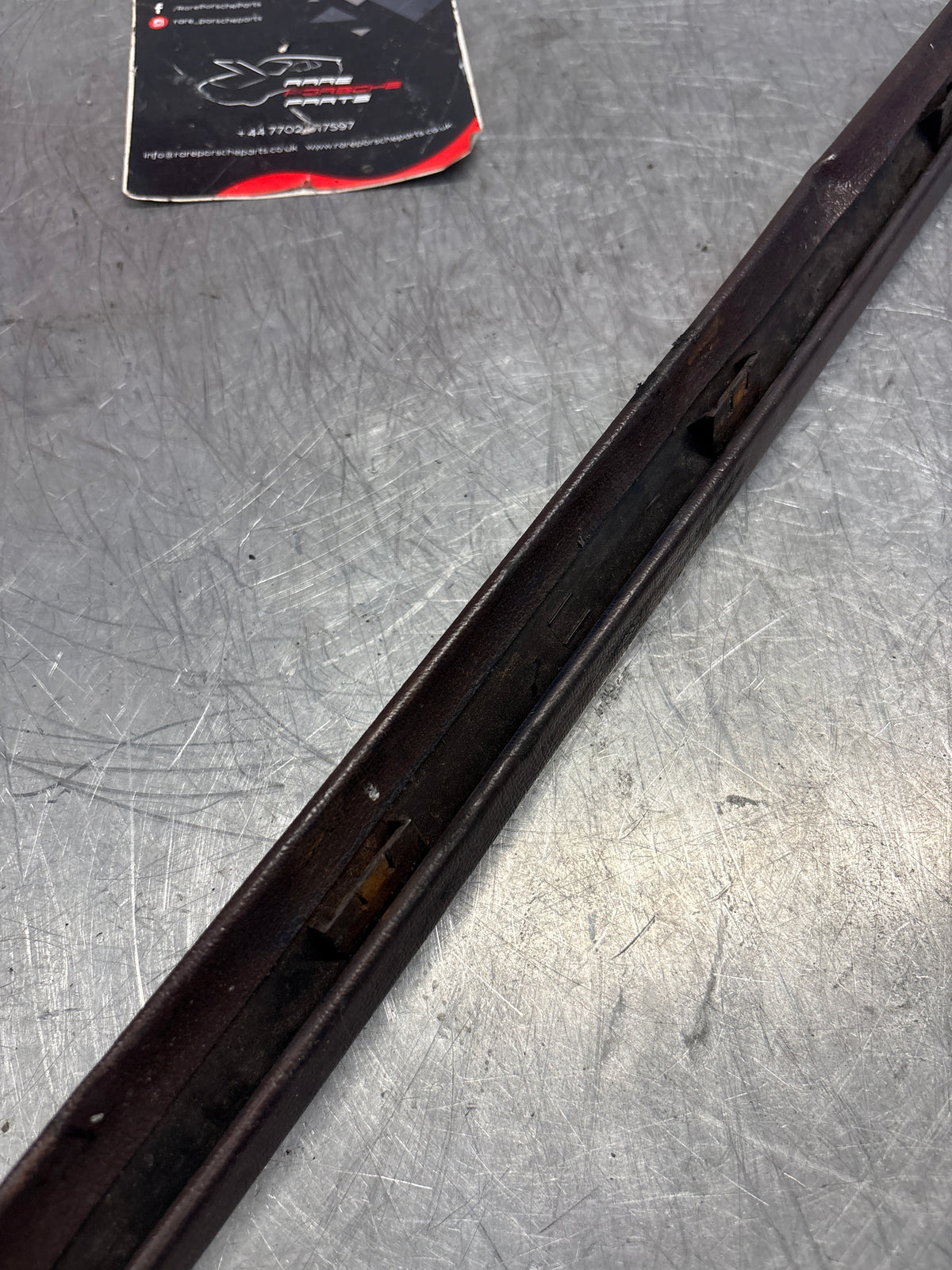 Porsche 928 tailgate trim, right, off side, burgundy, 92855503802, used