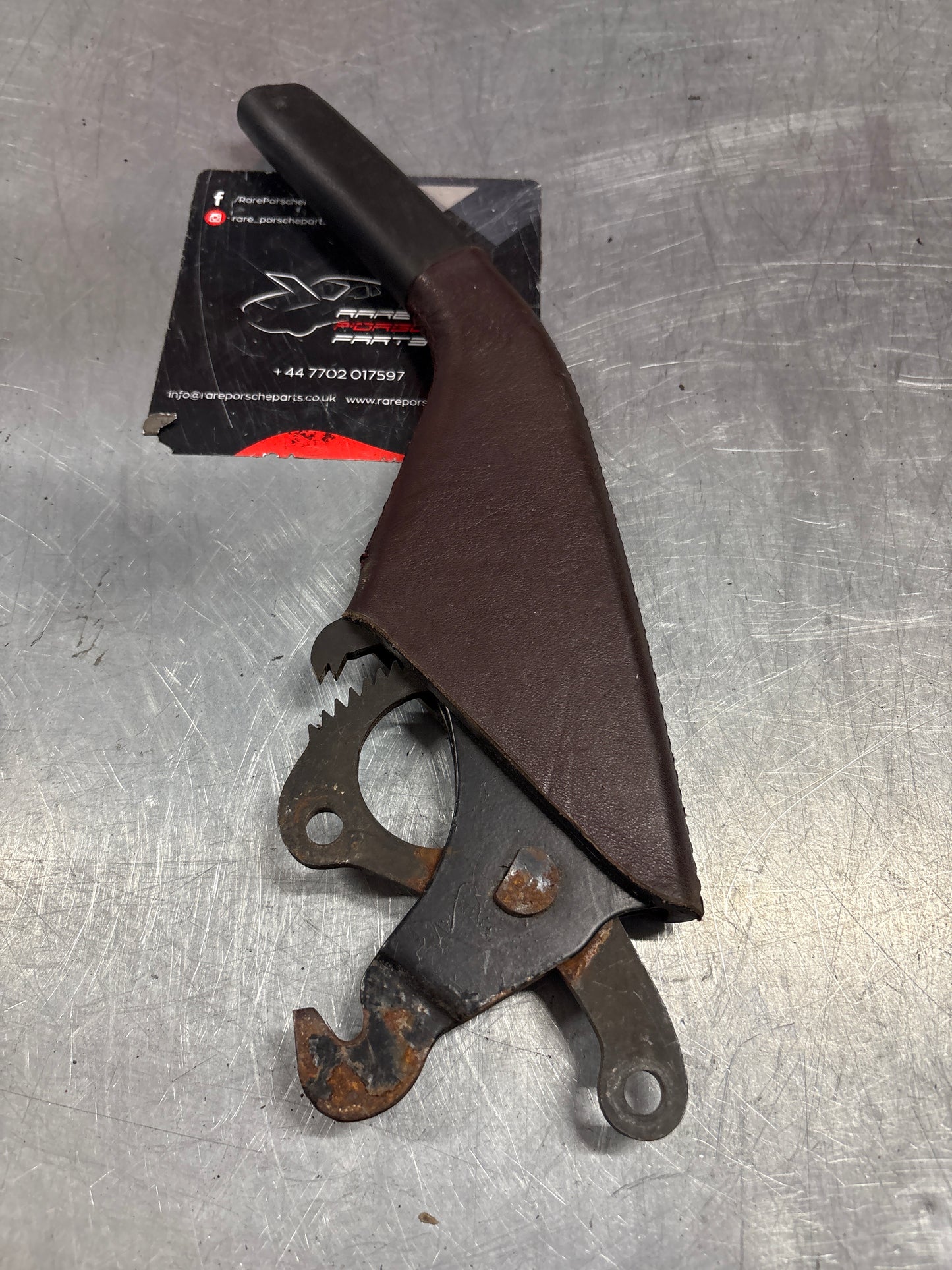 Porsche 944 handbrake lever from 85.5 burgundy, used 94442404900