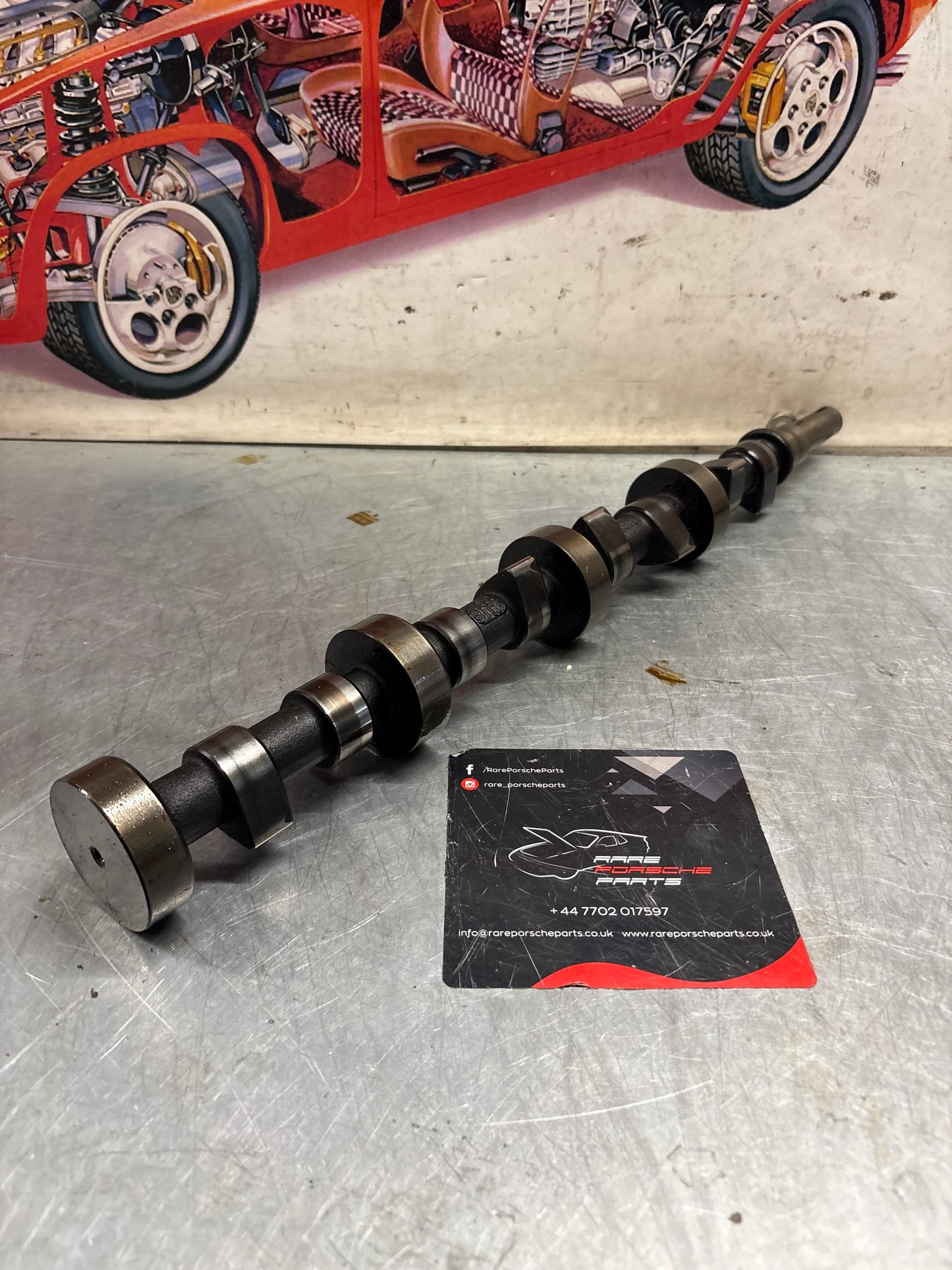 Porsche 928 cam shaft, used 9281052040R