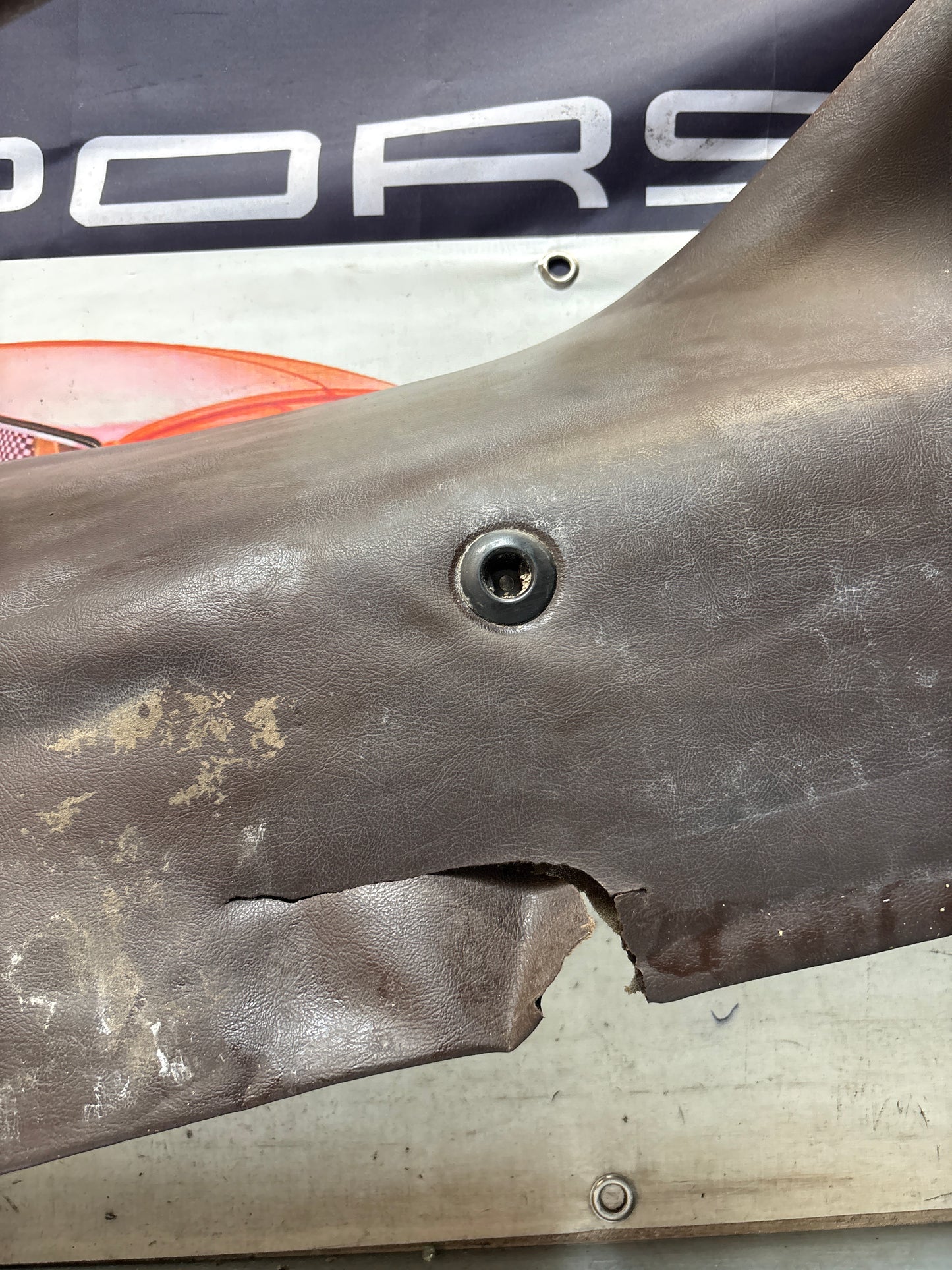 Porsche 928 early left side lower side trim panel, without loudspeaker, burgundy used 92855502102